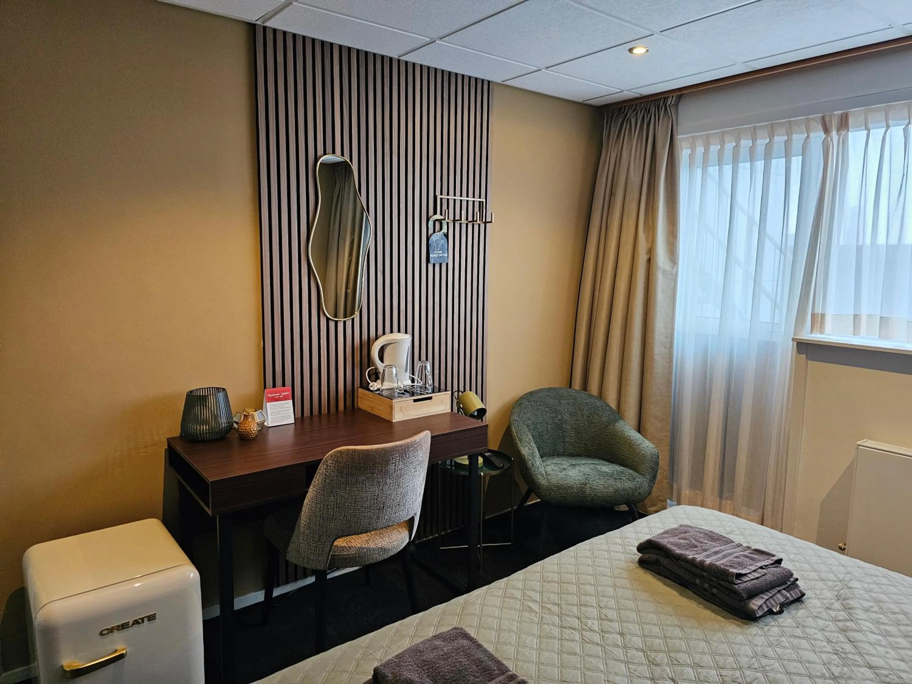 Living room, Bed in Hotel Restaurant Solskin