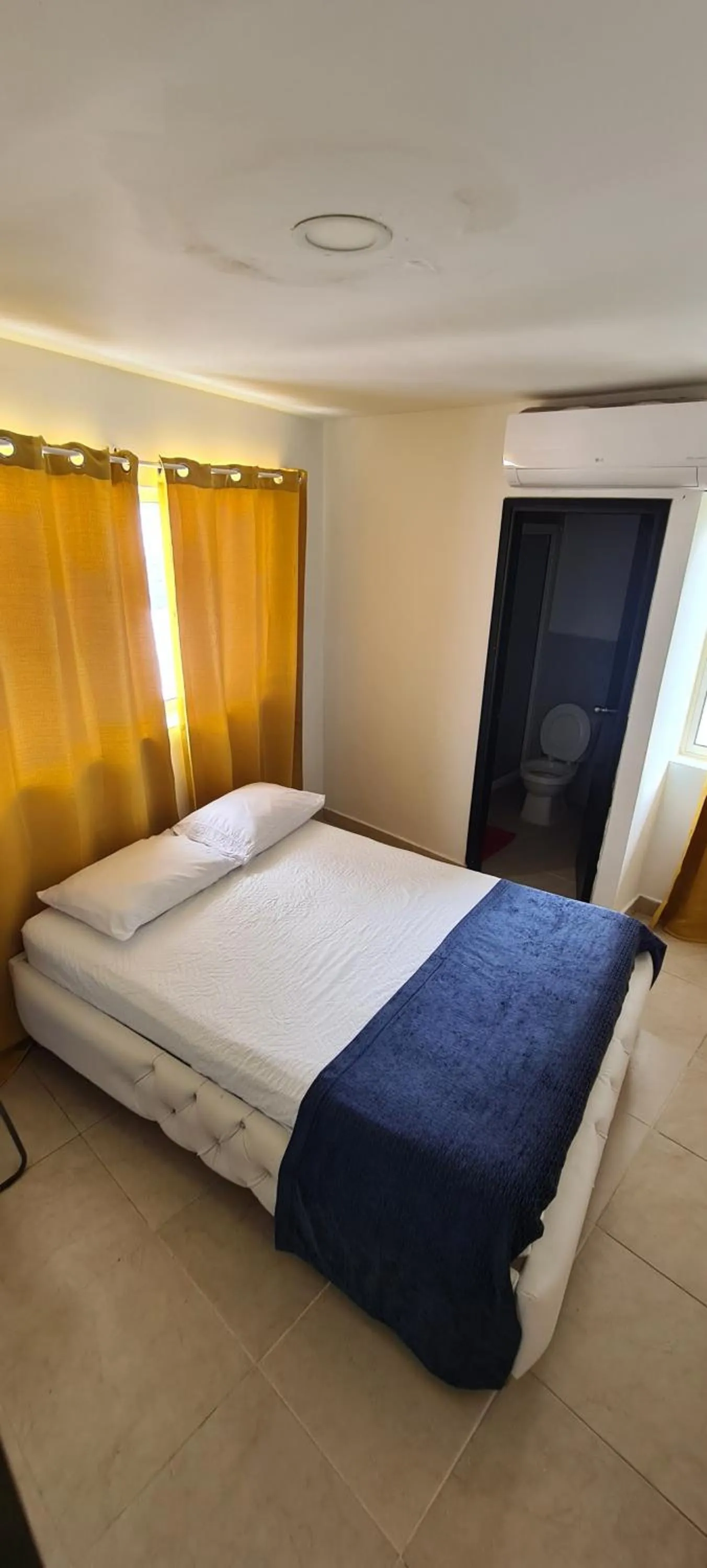 Photo of the whole room, Bed in Caribbean Island Hotel