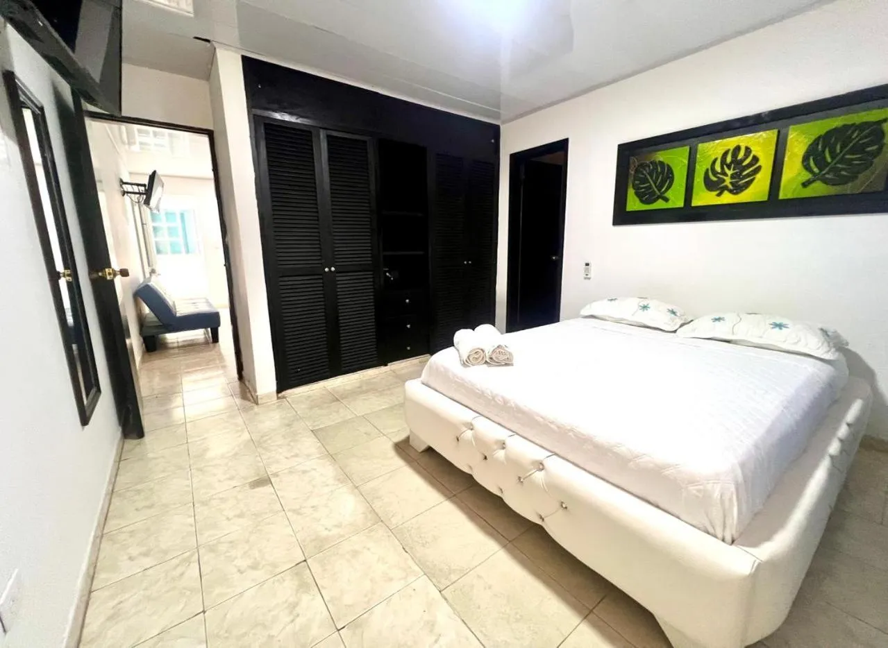 Photo of the whole room, Bed in Caribbean Island Hotel