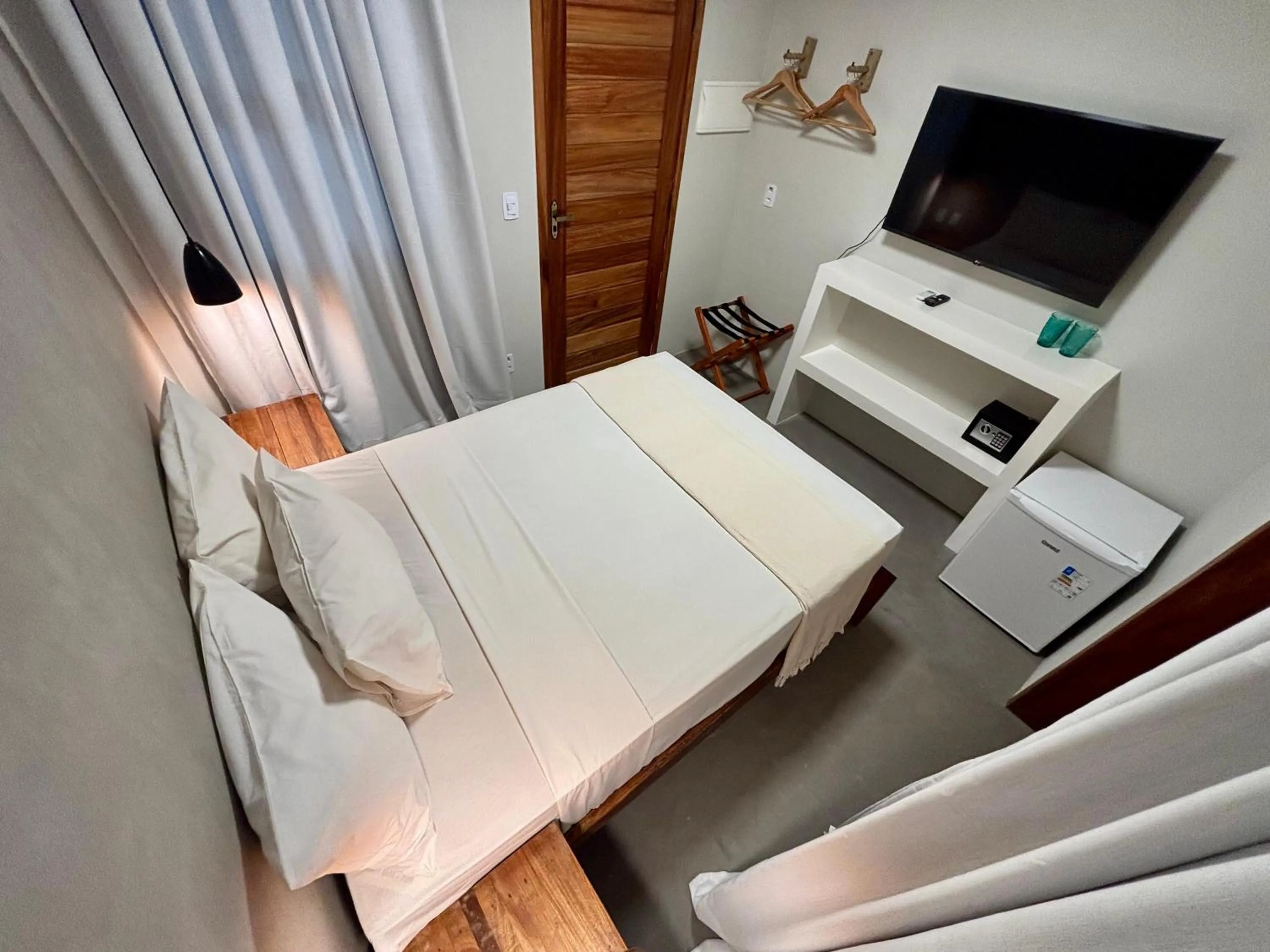 Bed in Pousada Baobá