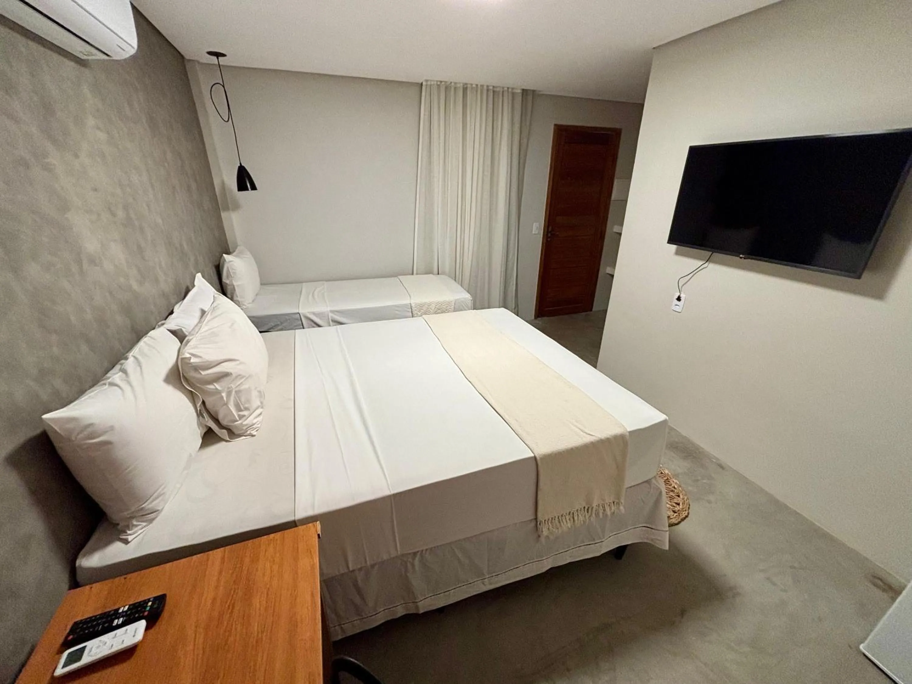 Bed in Pousada Baobá