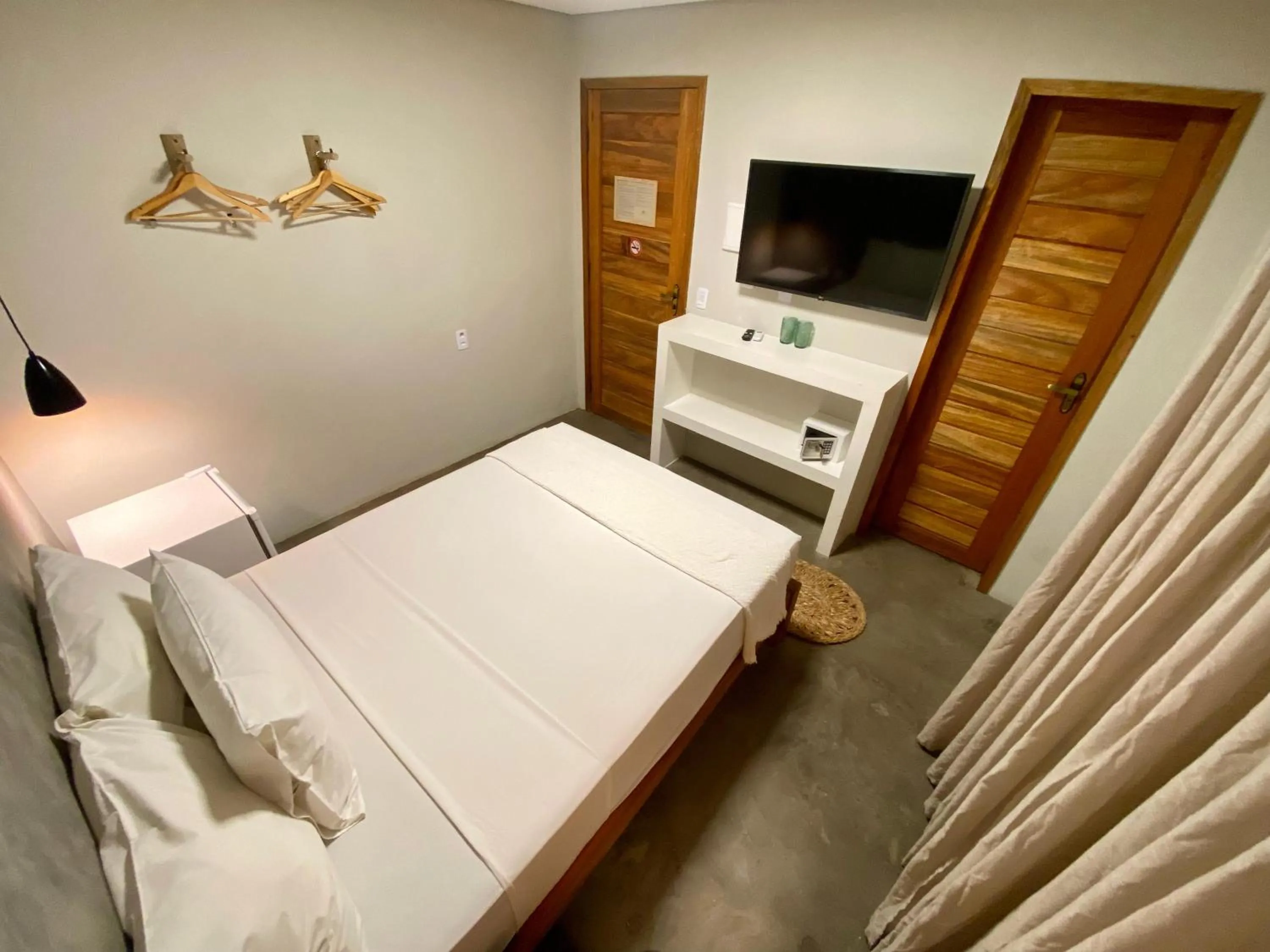 Bed in Pousada Baobá