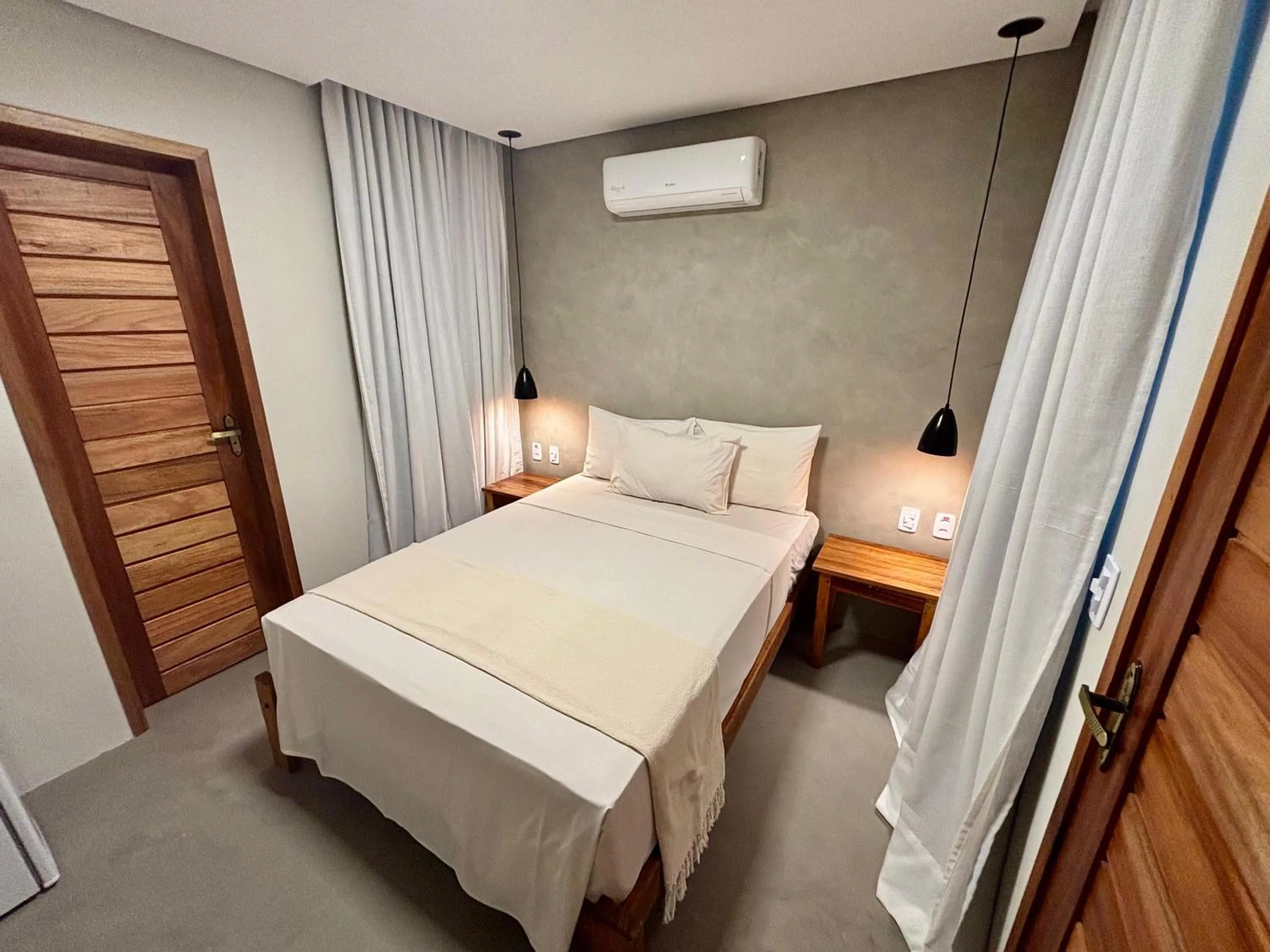 Bed in Pousada Baobá