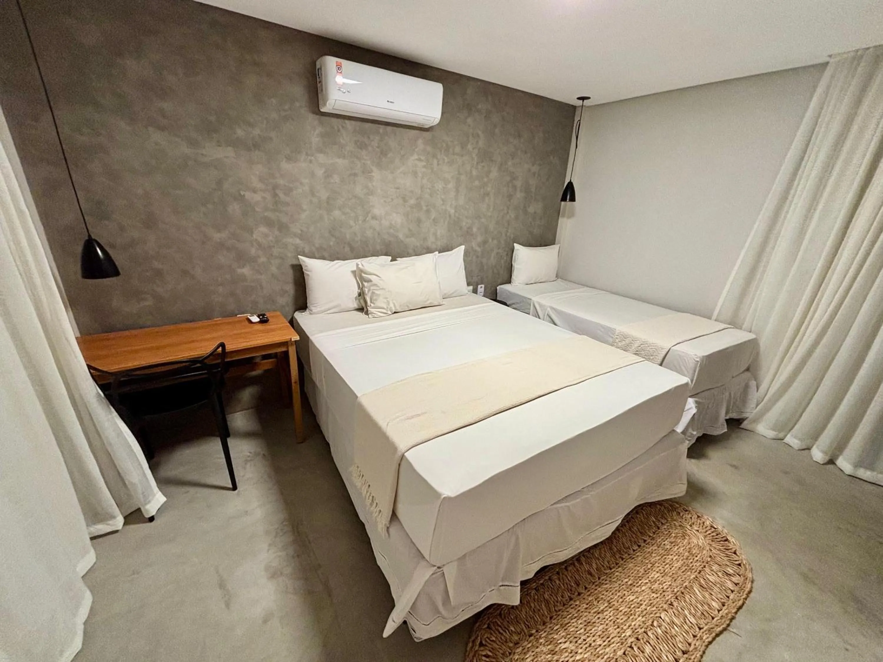 Bed in Pousada Baobá