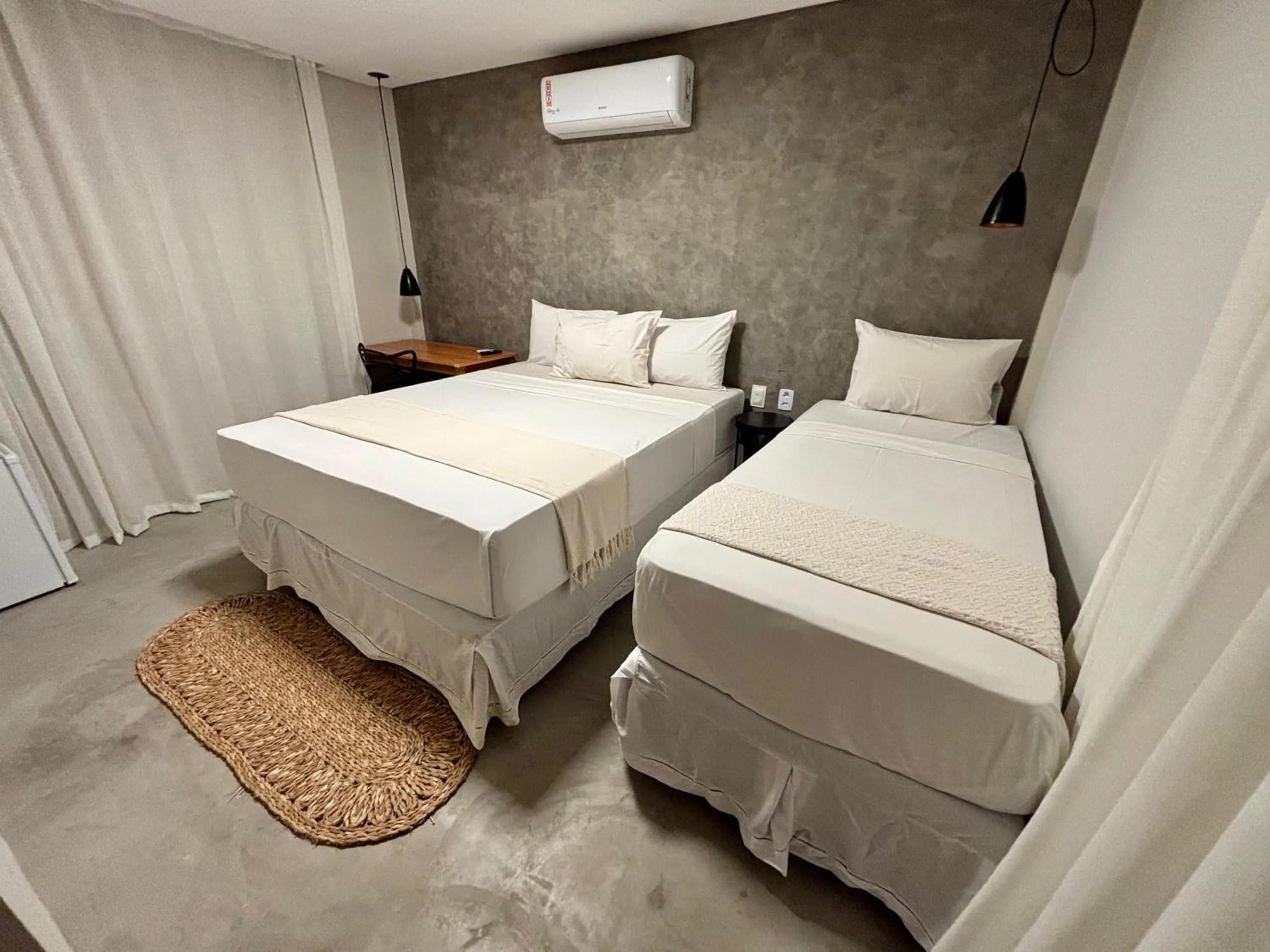 Bed in Pousada Baobá