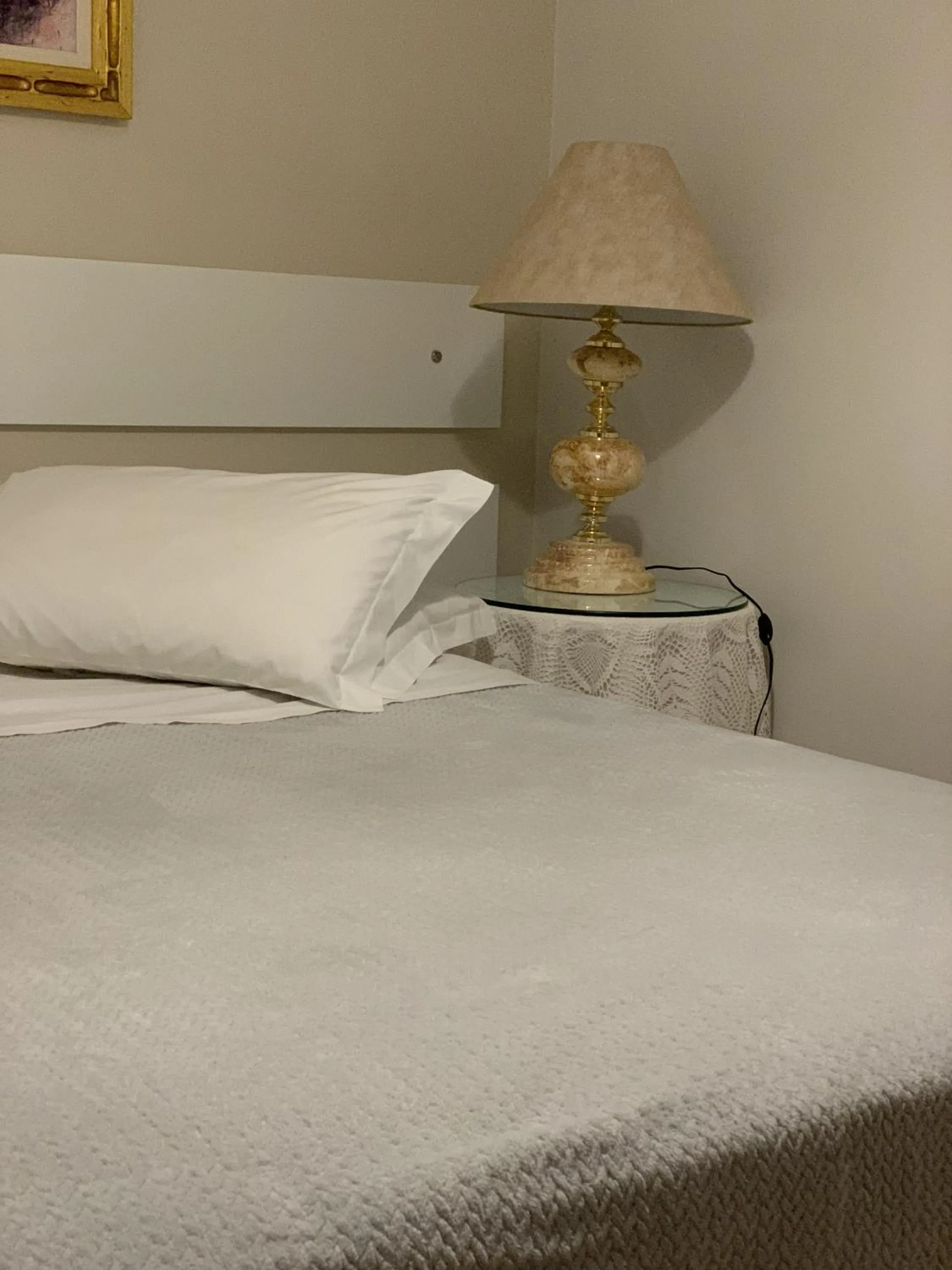 Bed in Hotel Imigrantes