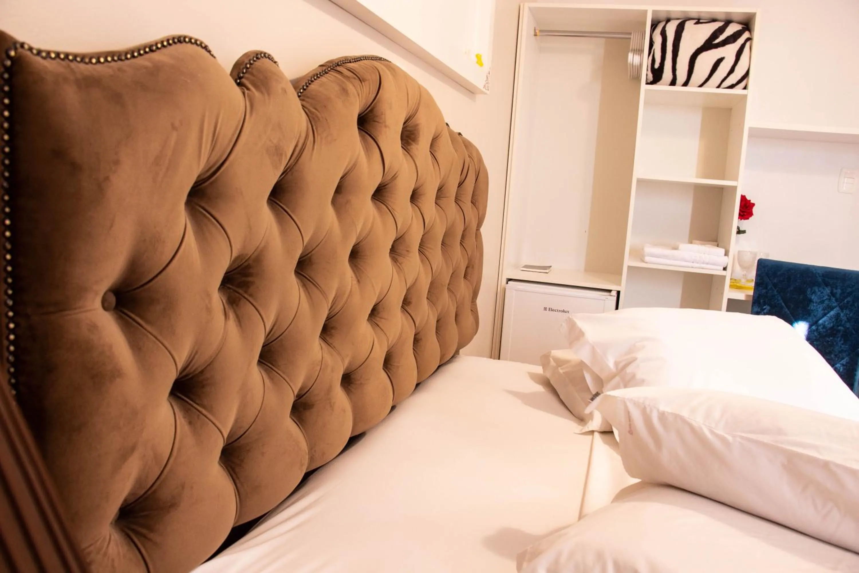 Bed in Hotel Imigrantes