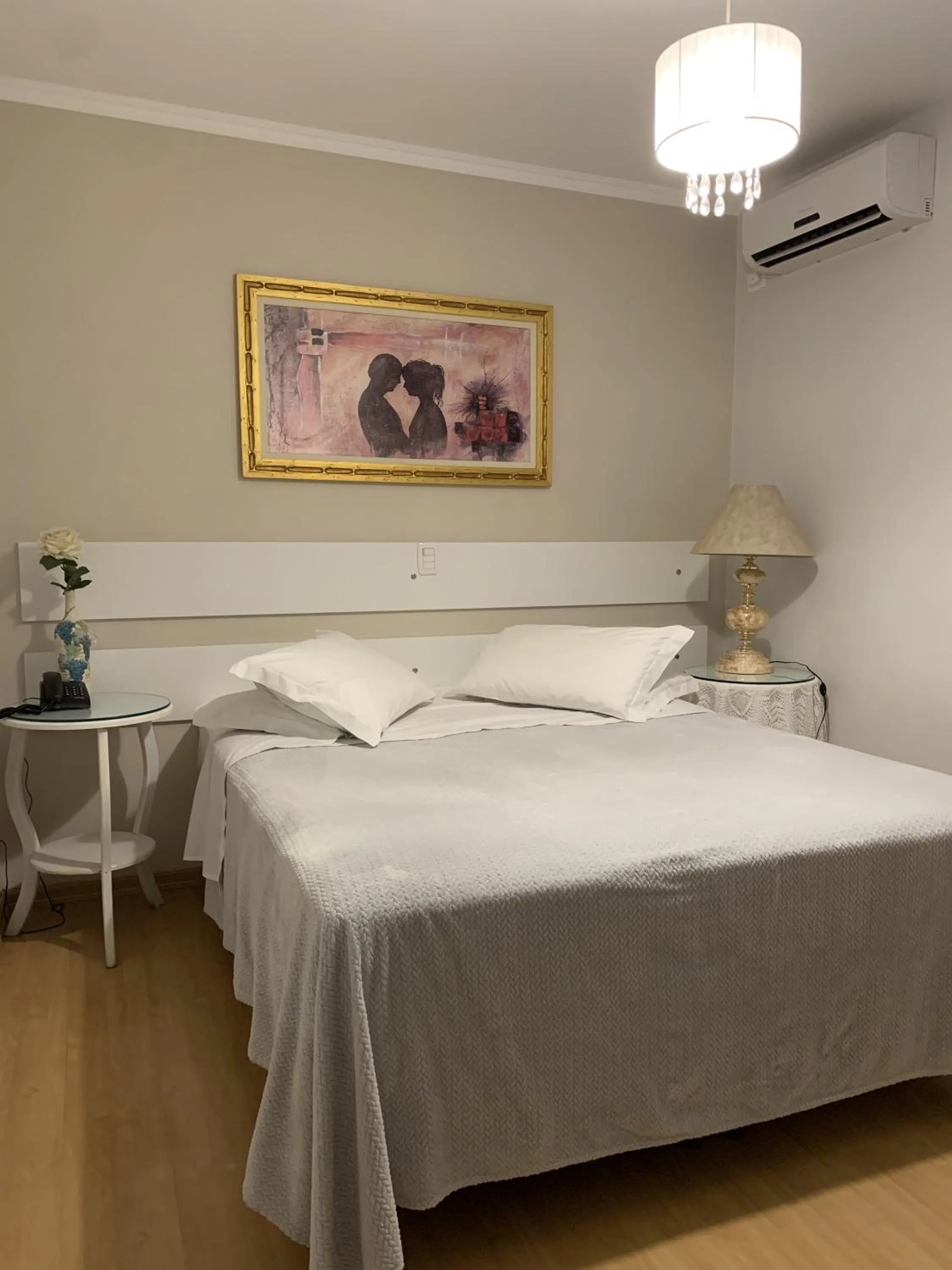 Bed in Hotel Imigrantes