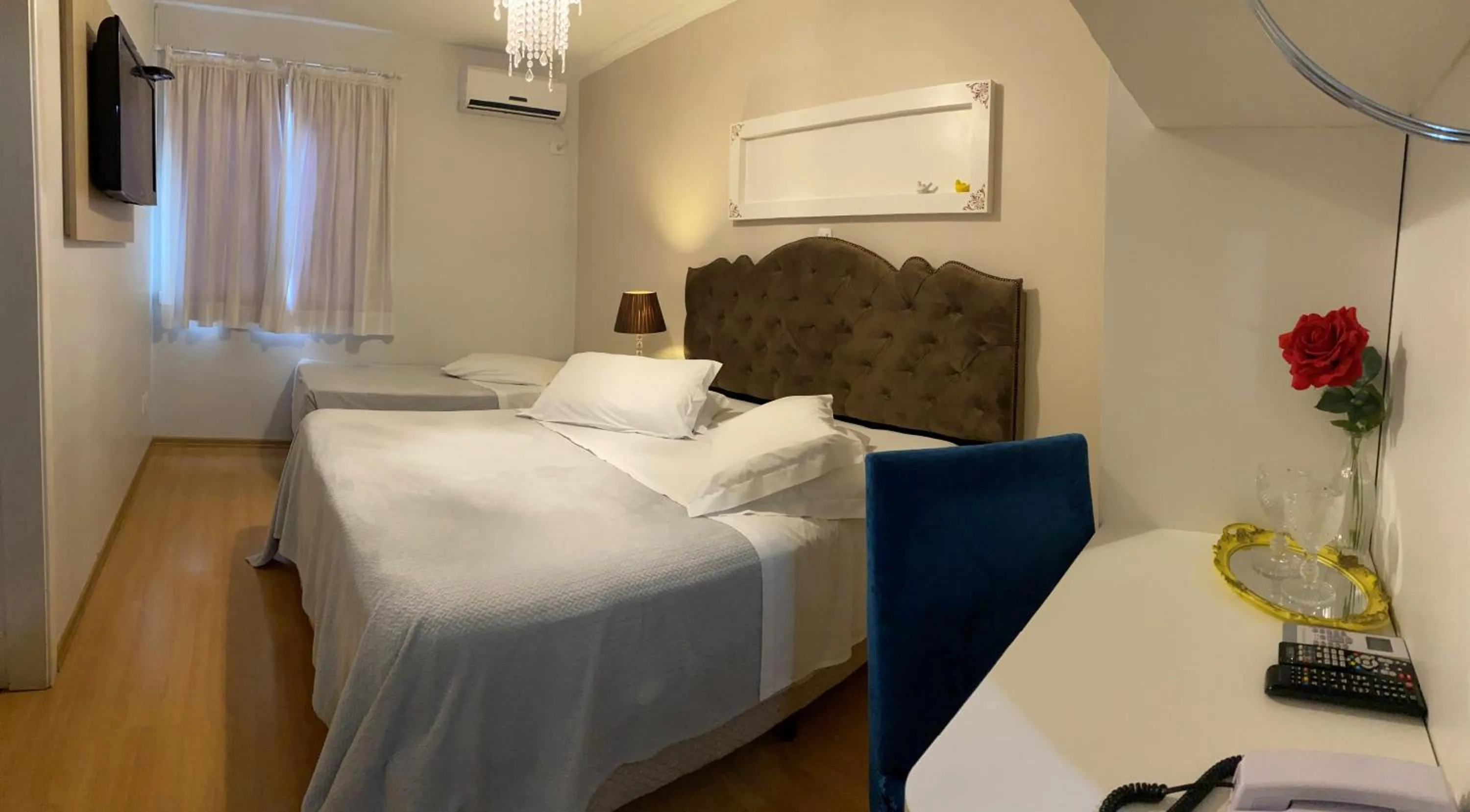 Bed in Hotel Imigrantes