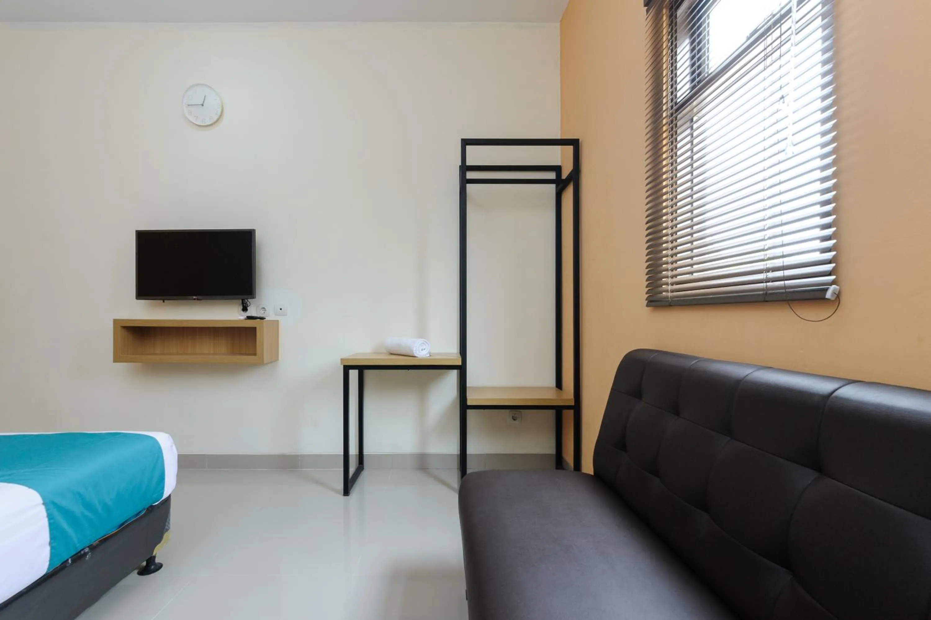 Bedroom, Bed in Sans Hotel Cibanteng Dramaga Bogor