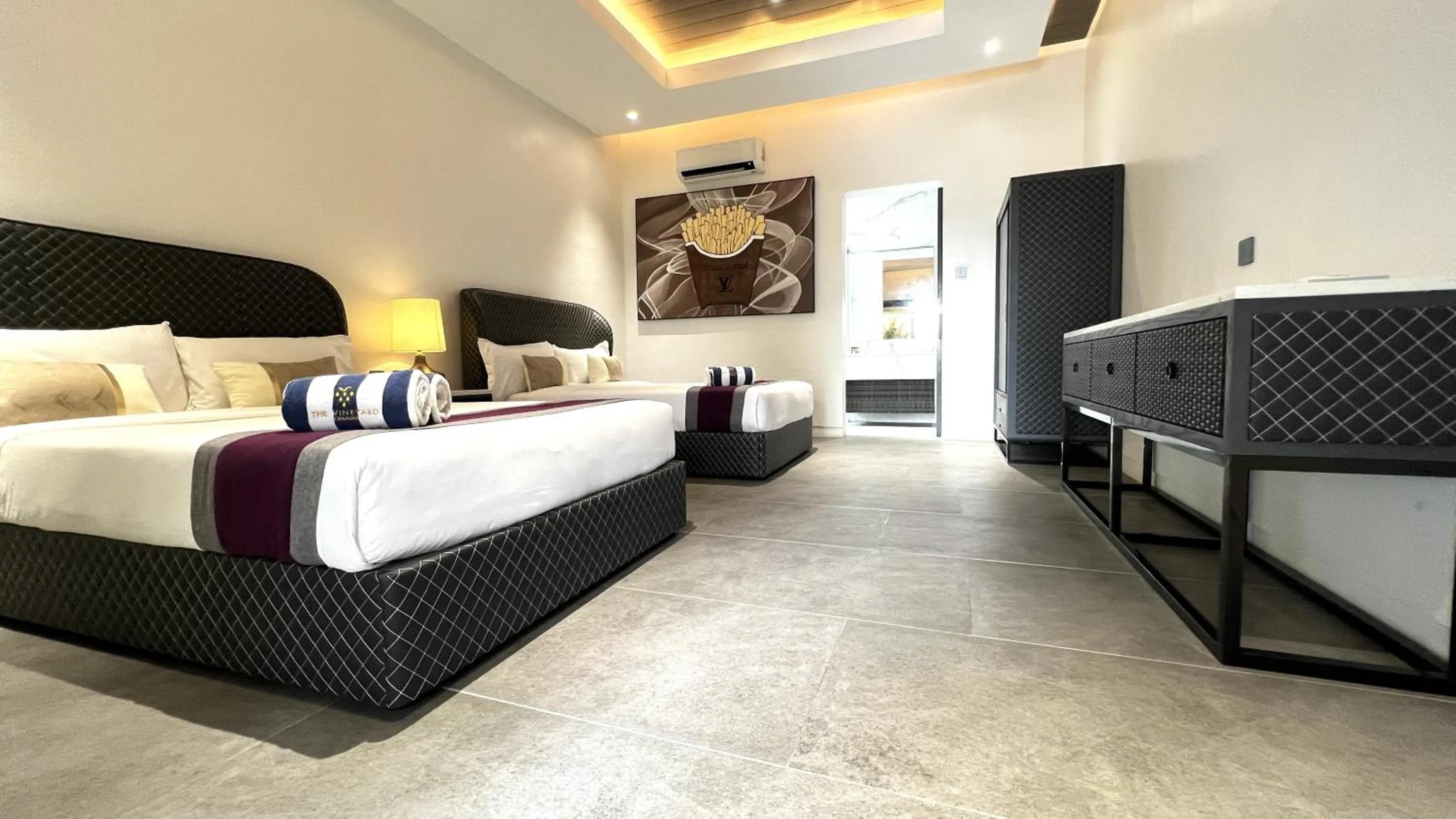 Photo of the whole room, Bed in The Vineyard at Tanauan