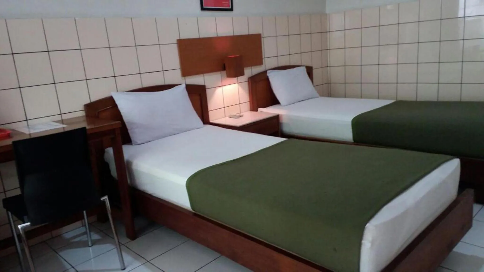 Bedroom in HOTEL ANEKA BARU