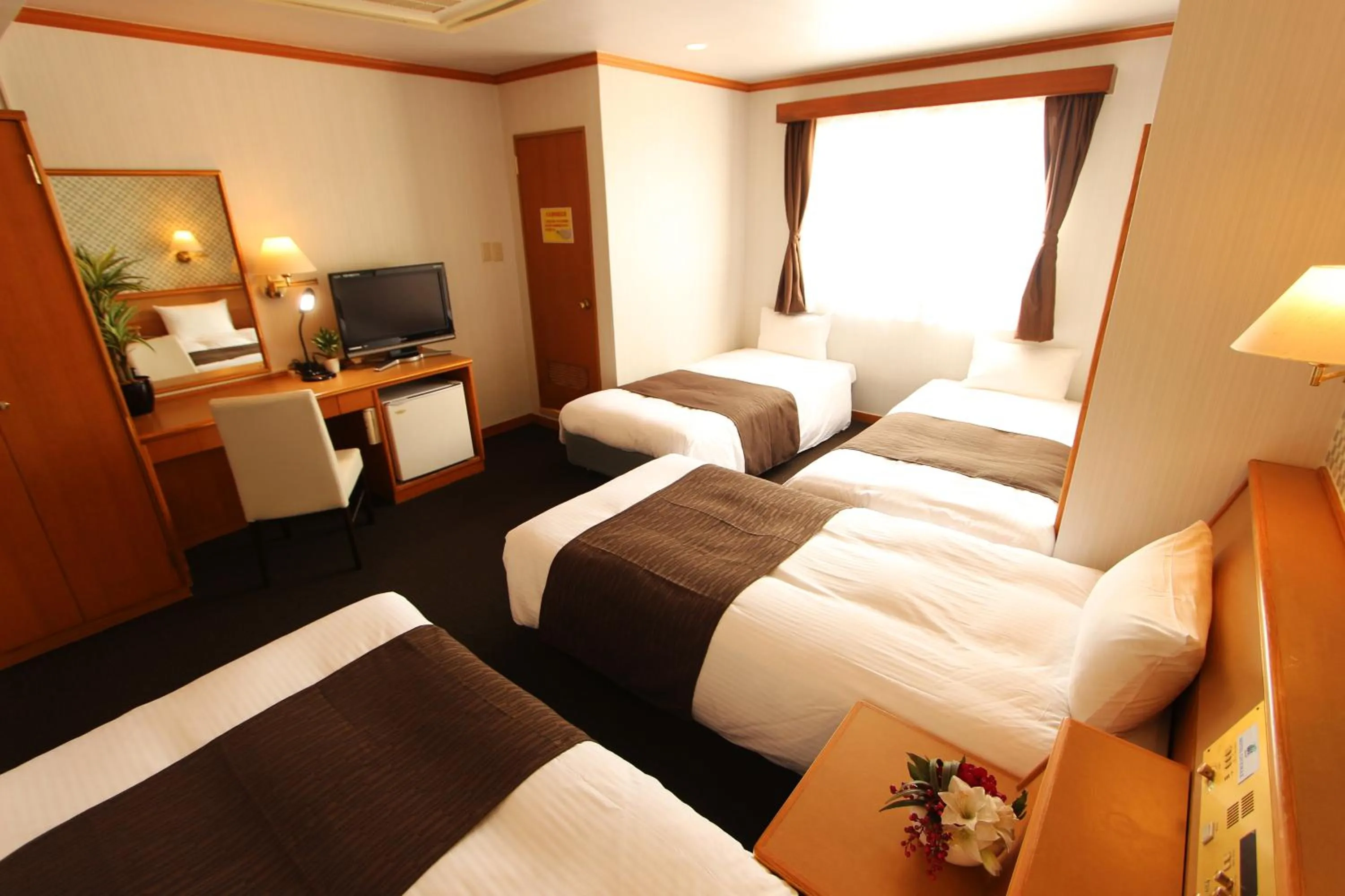 Photo of the whole room in HOTEL LiVEMAX BUDGET Okinawa Tomariko