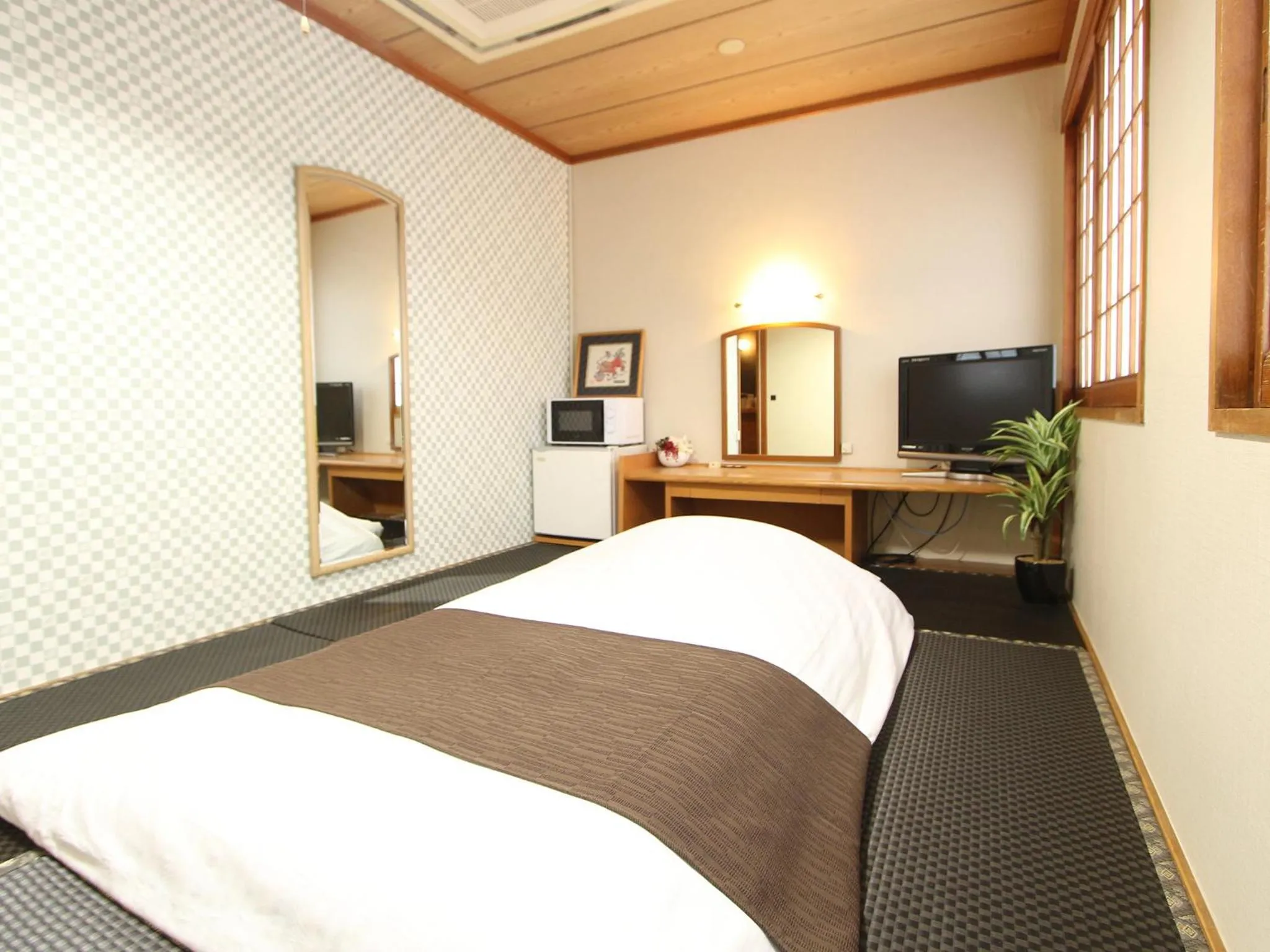 Photo of the whole room in HOTEL LiVEMAX BUDGET Okinawa Tomariko