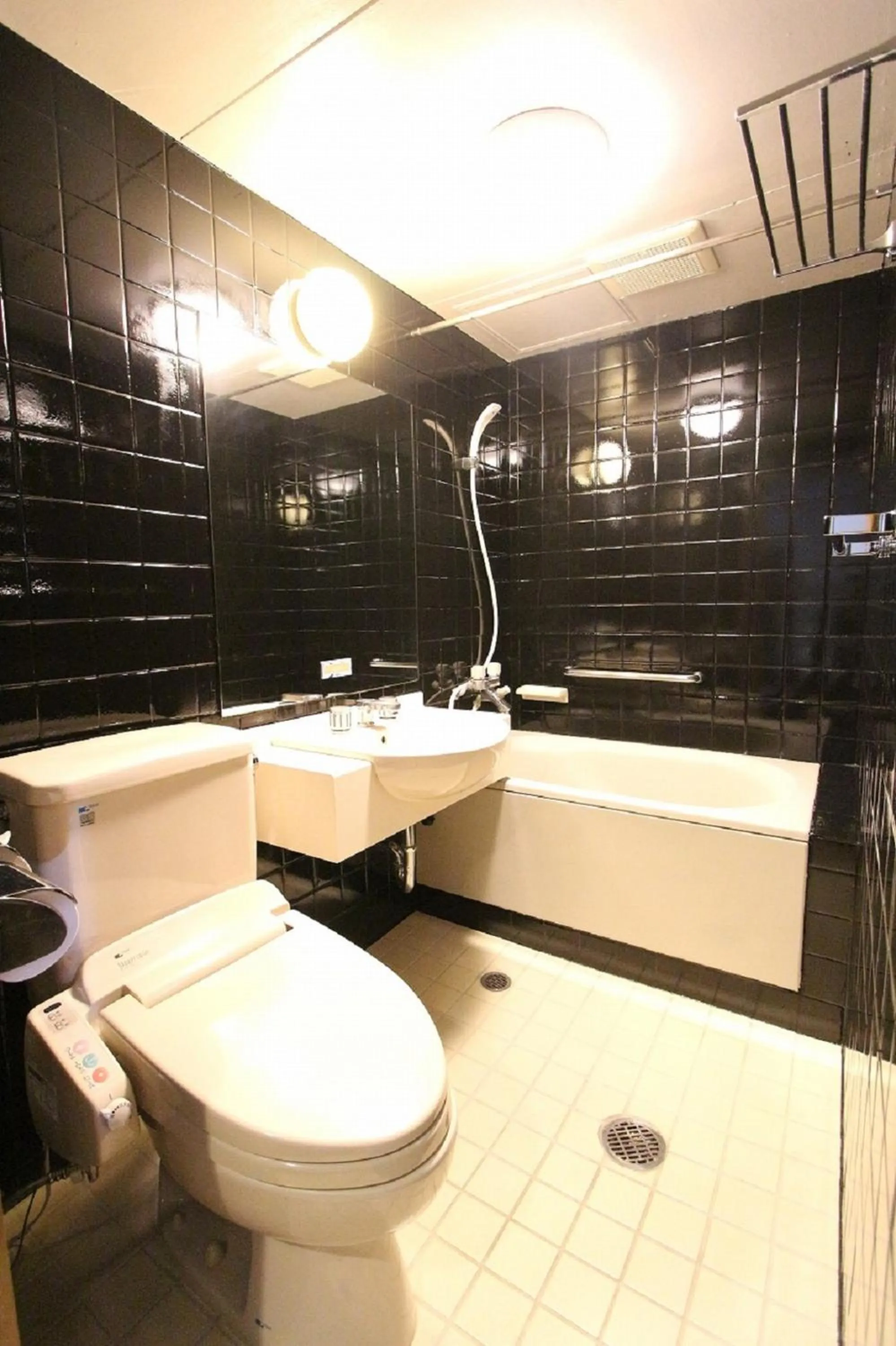 Bathroom in HOTEL LiVEMAX BUDGET Okinawa Tomariko
