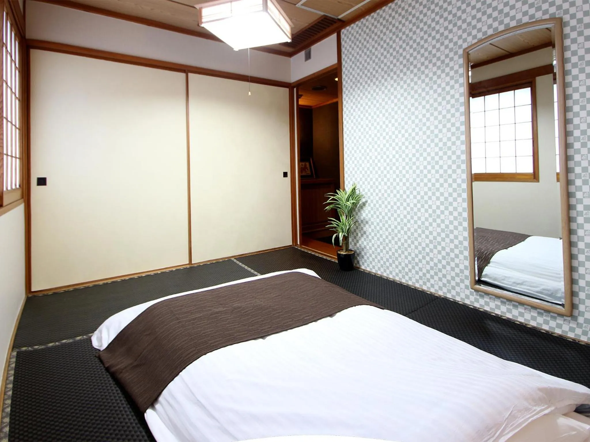 Photo of the whole room in HOTEL LiVEMAX BUDGET Okinawa Tomariko