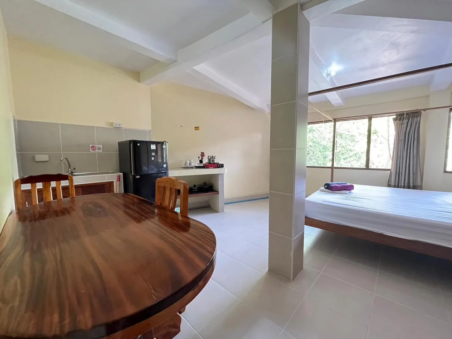 Bed in Hin Wong Apartments Dive & Snorkel Resort