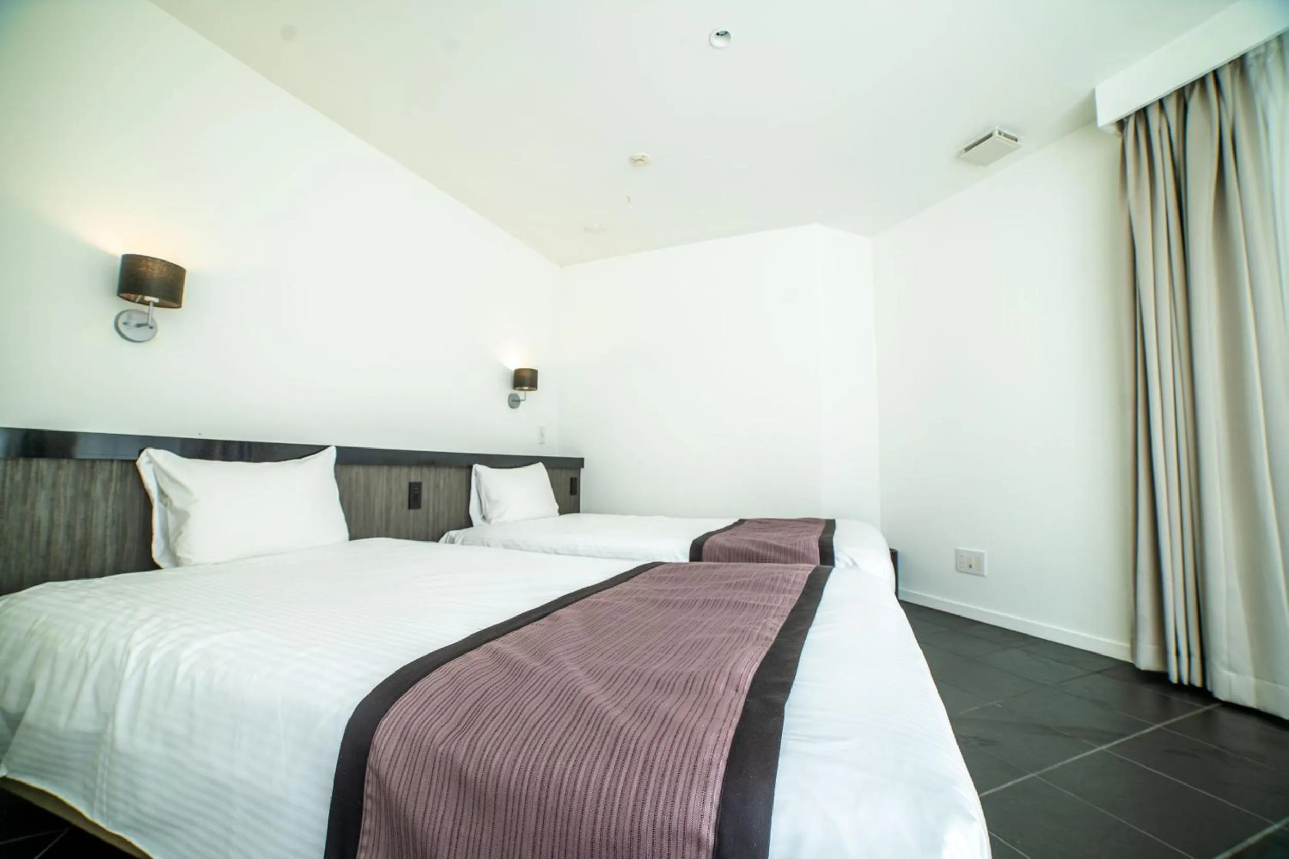 Bed in Crystal Villa Miyakojima Sunayama Beach