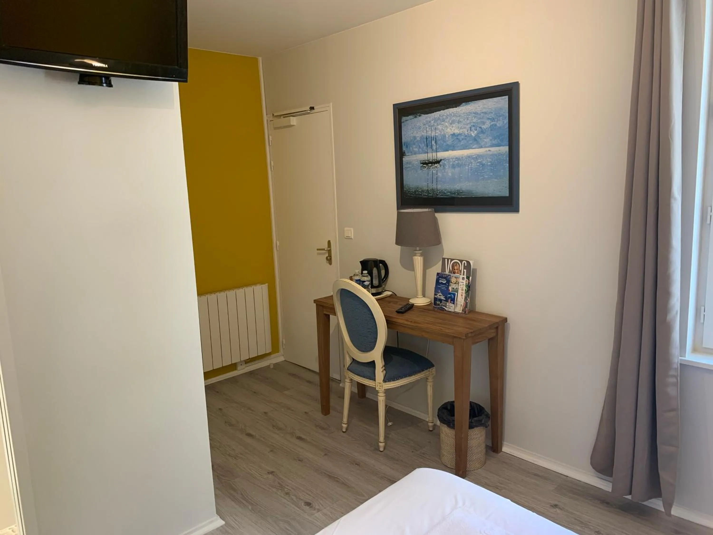 Bedroom in Hôtel Au Grand Duquesne