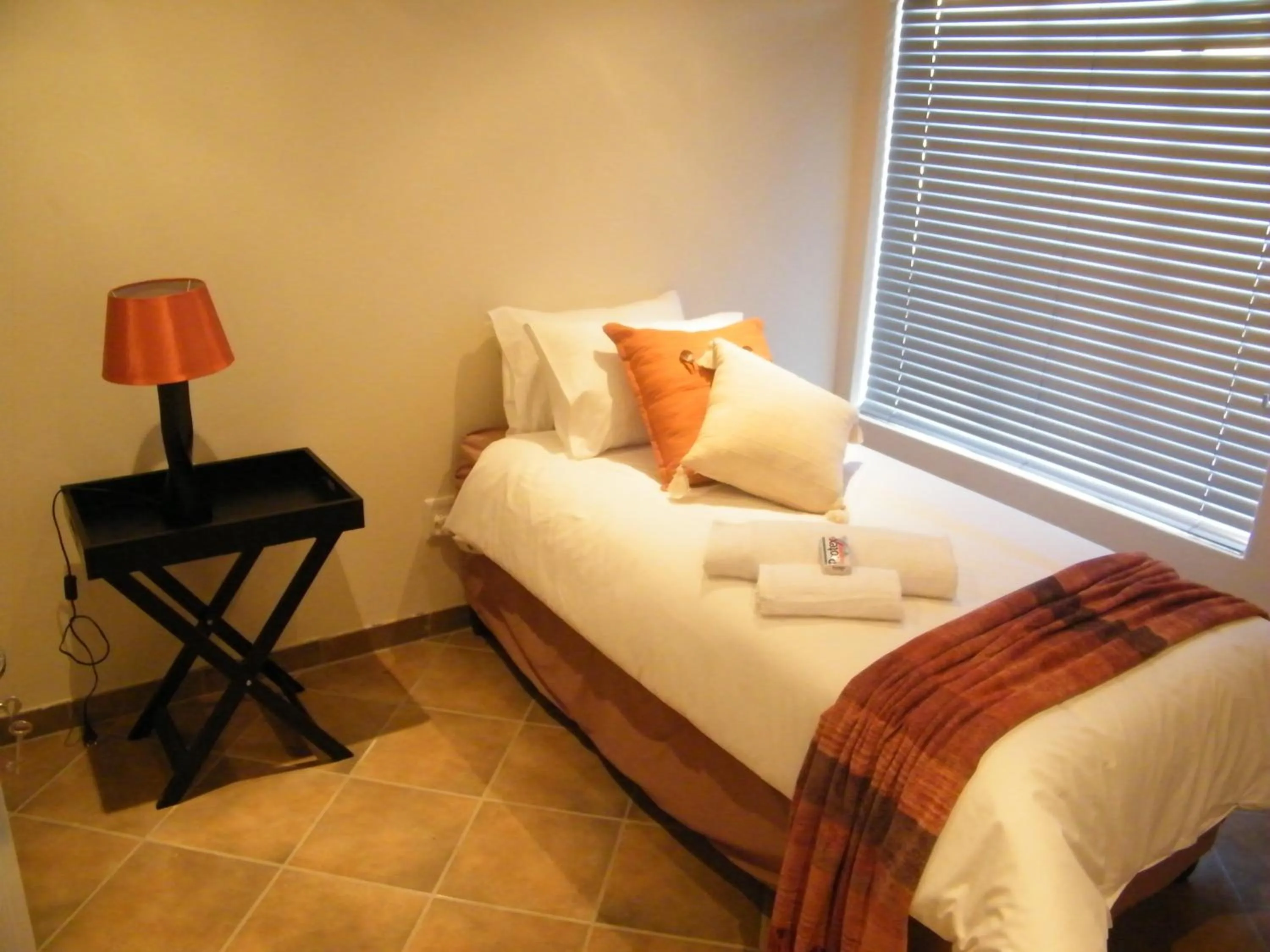 Photo of the whole room, Bed in Airport Lodge Guest House