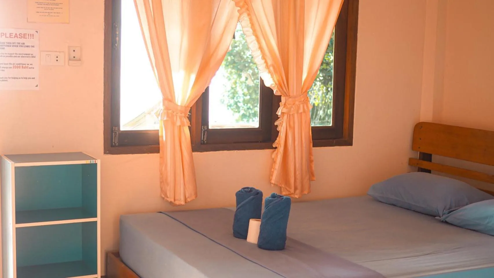 Bed in J.B.Hut Bungalows