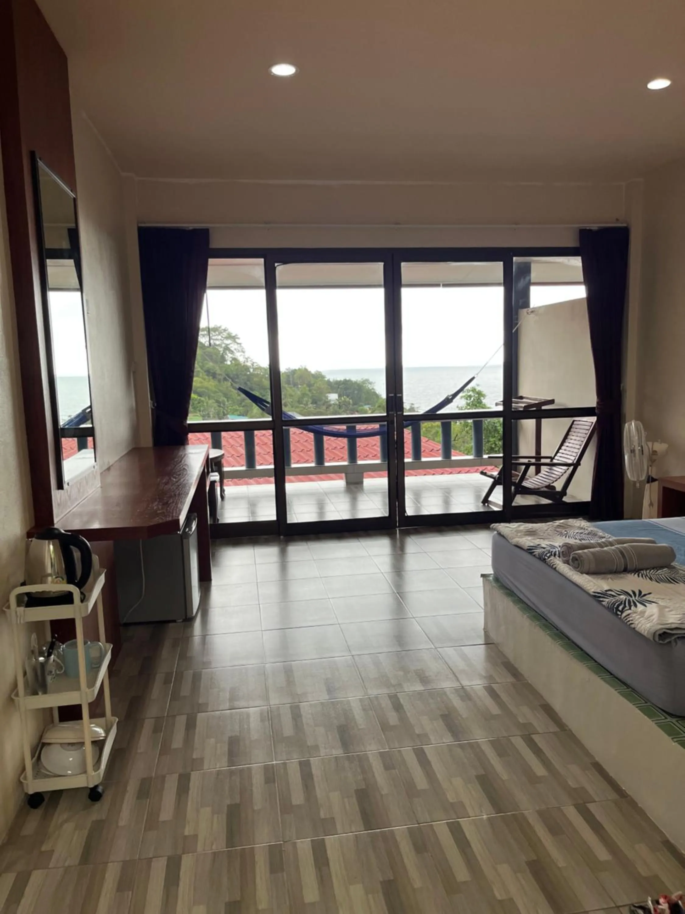 Bed in J.B.Hut Bungalows