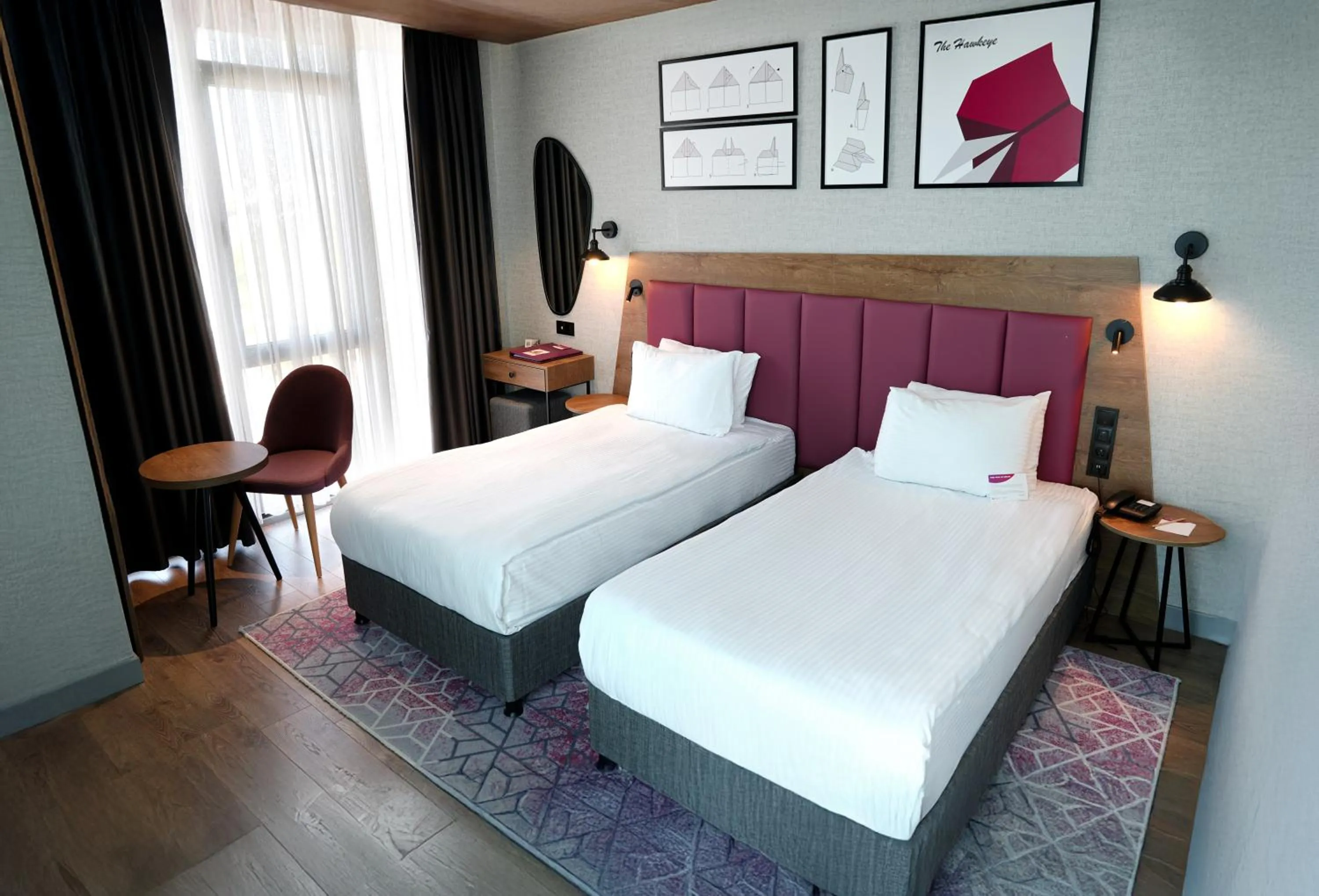 Bed in Ramada Encore by Wyndham Istanbul Arnavutkoy