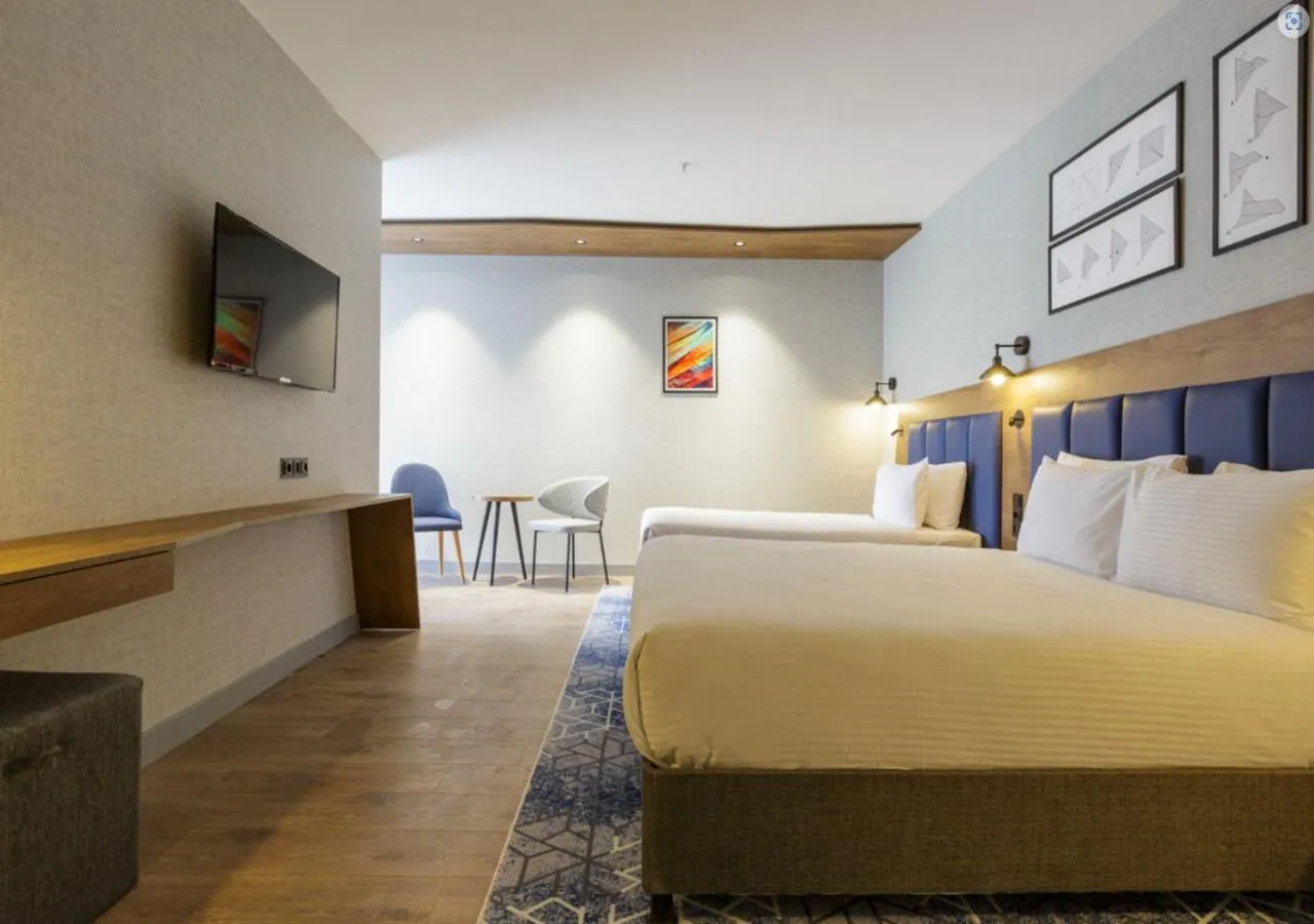 Bed in Ramada Encore by Wyndham Istanbul Arnavutkoy