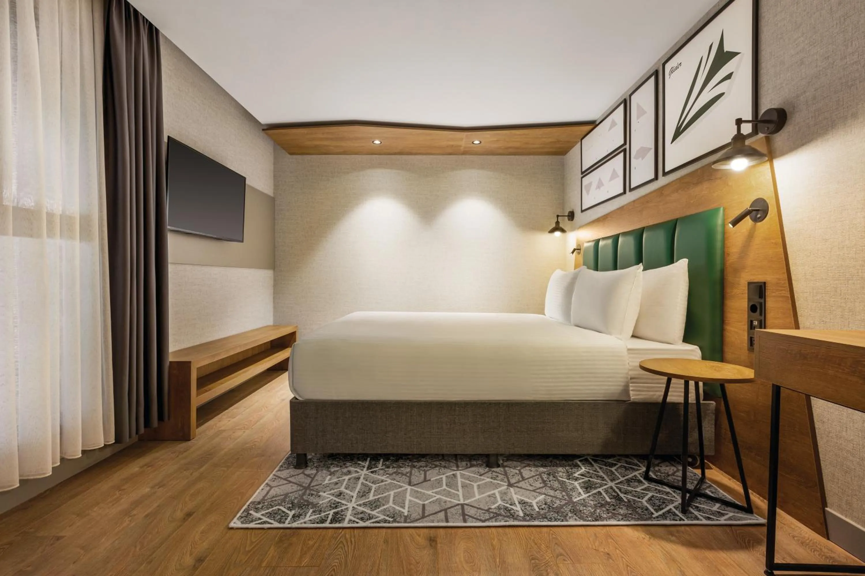 Bed in Ramada Encore by Wyndham Istanbul Arnavutkoy