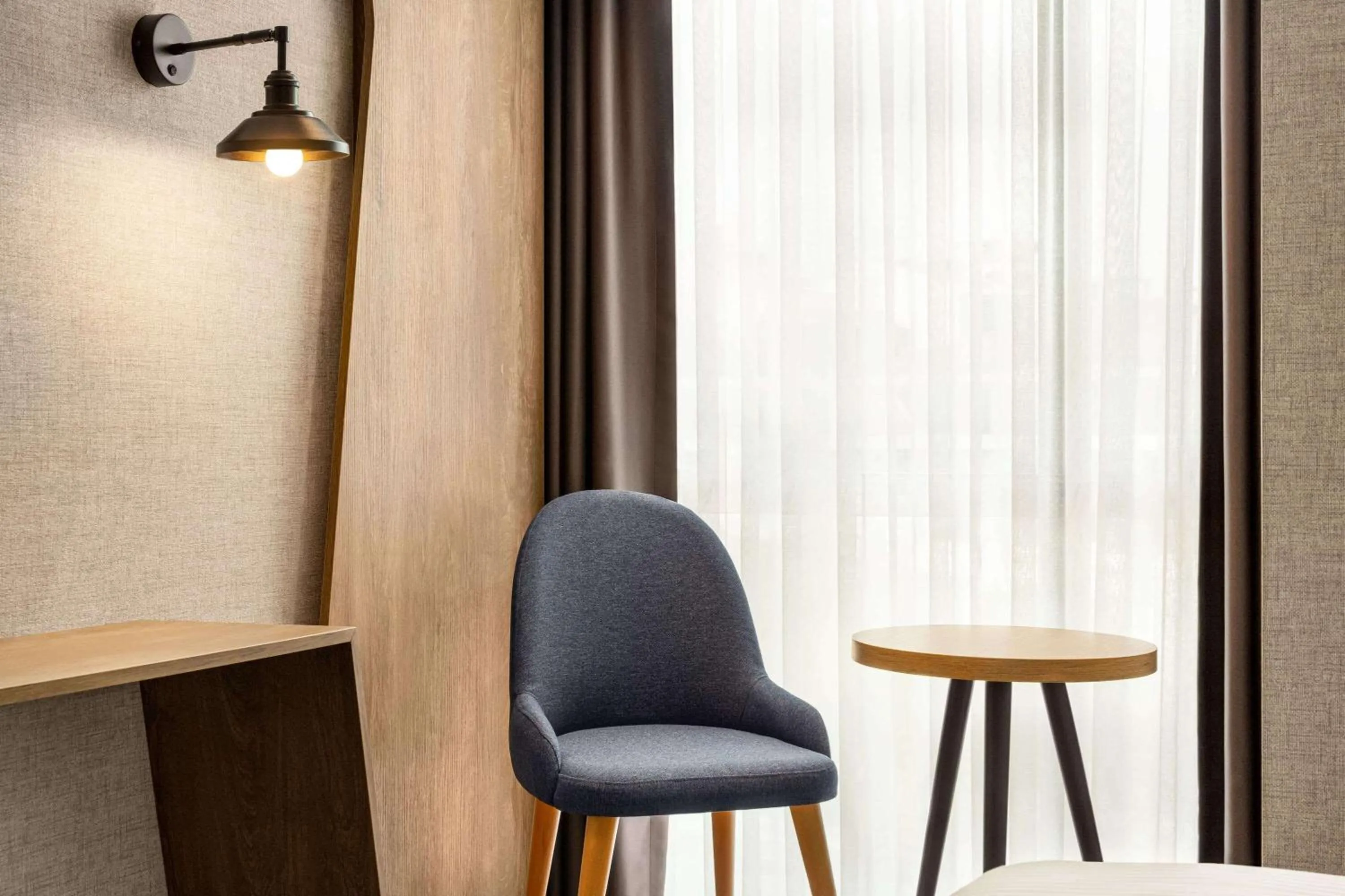 Photo of the whole room in Ramada Encore by Wyndham Istanbul Arnavutkoy