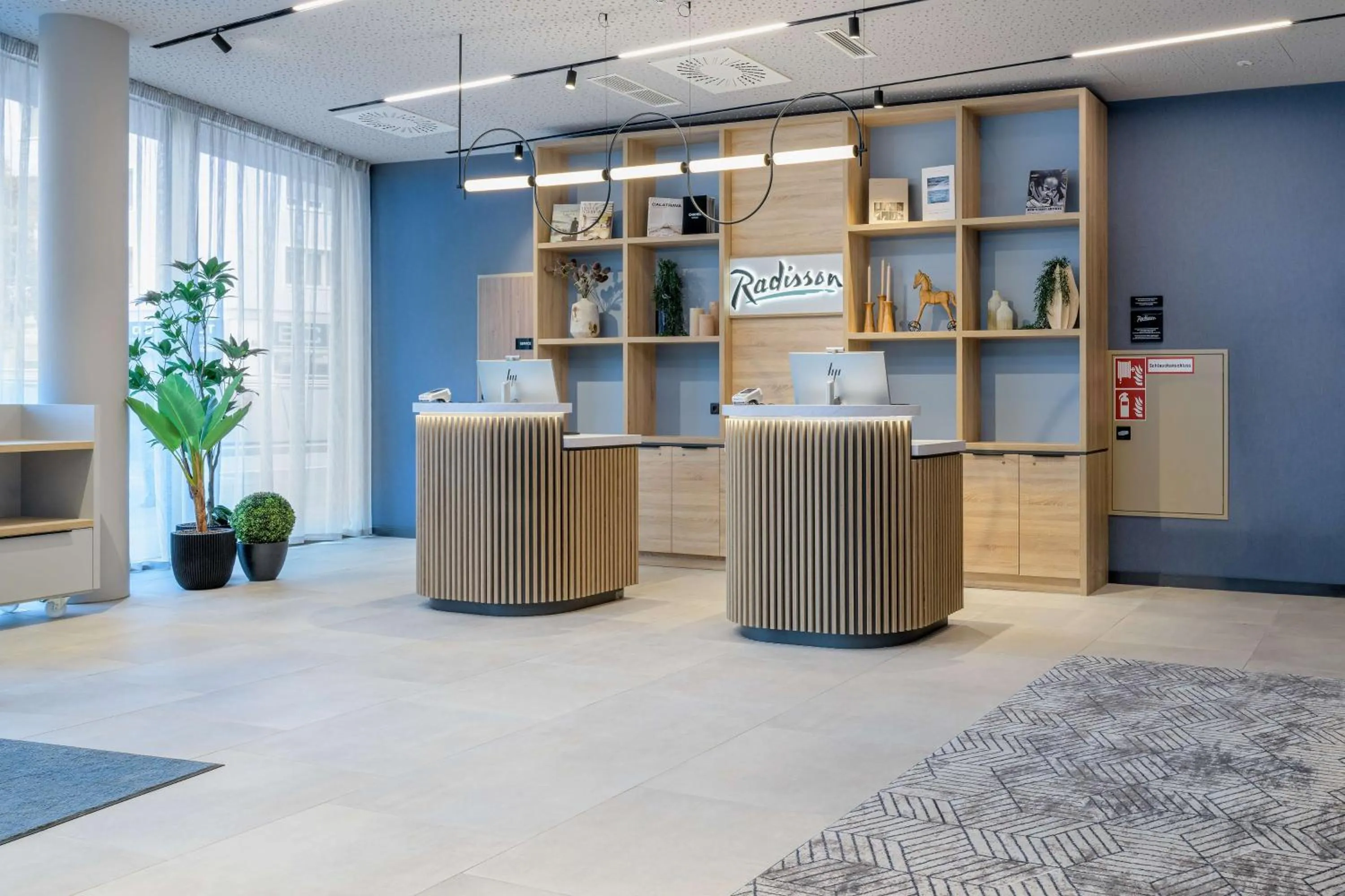 Lobby or reception in Radisson Hotel Graz