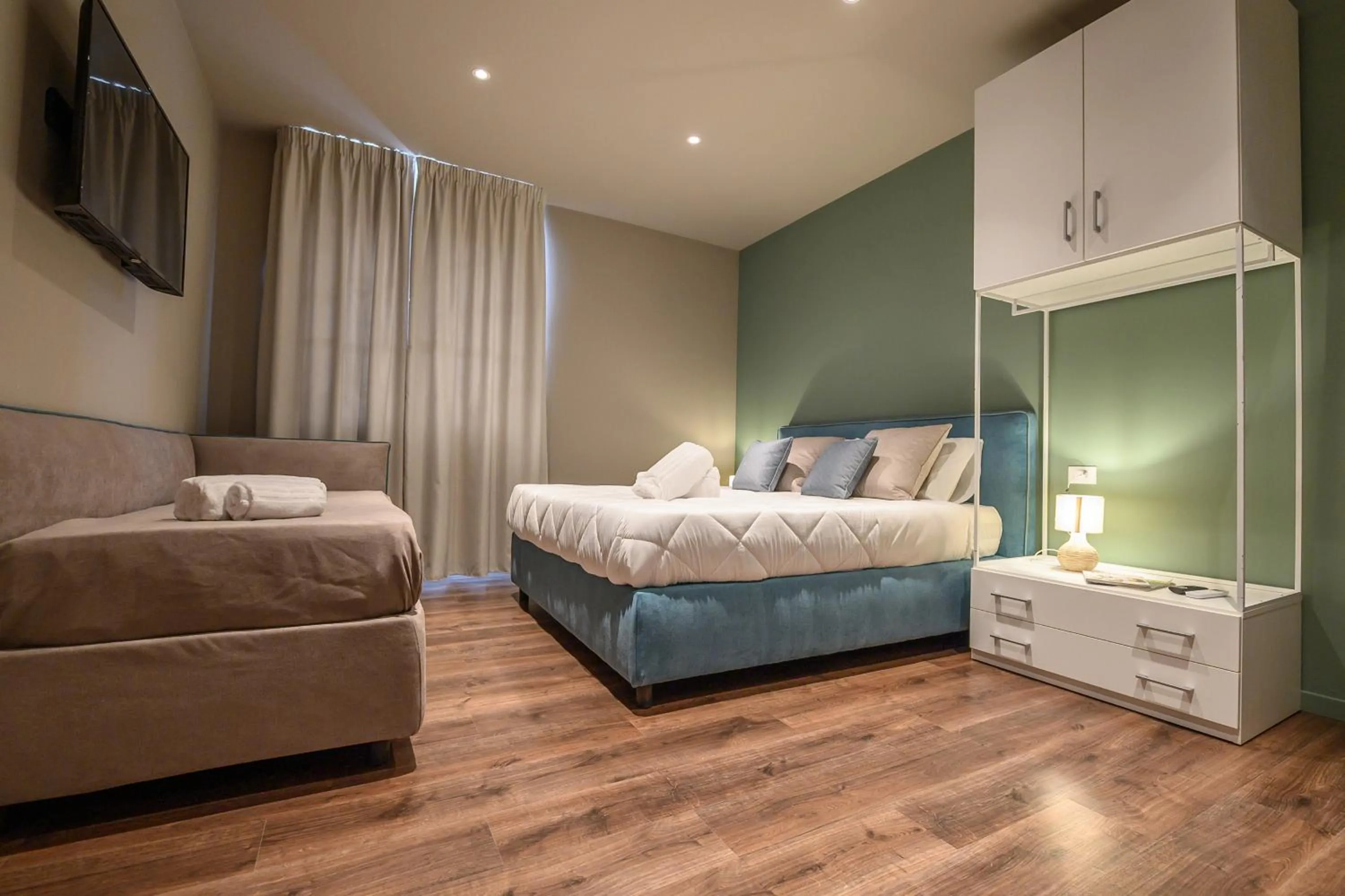 TV and multimedia, Bed in Baitan Hotel