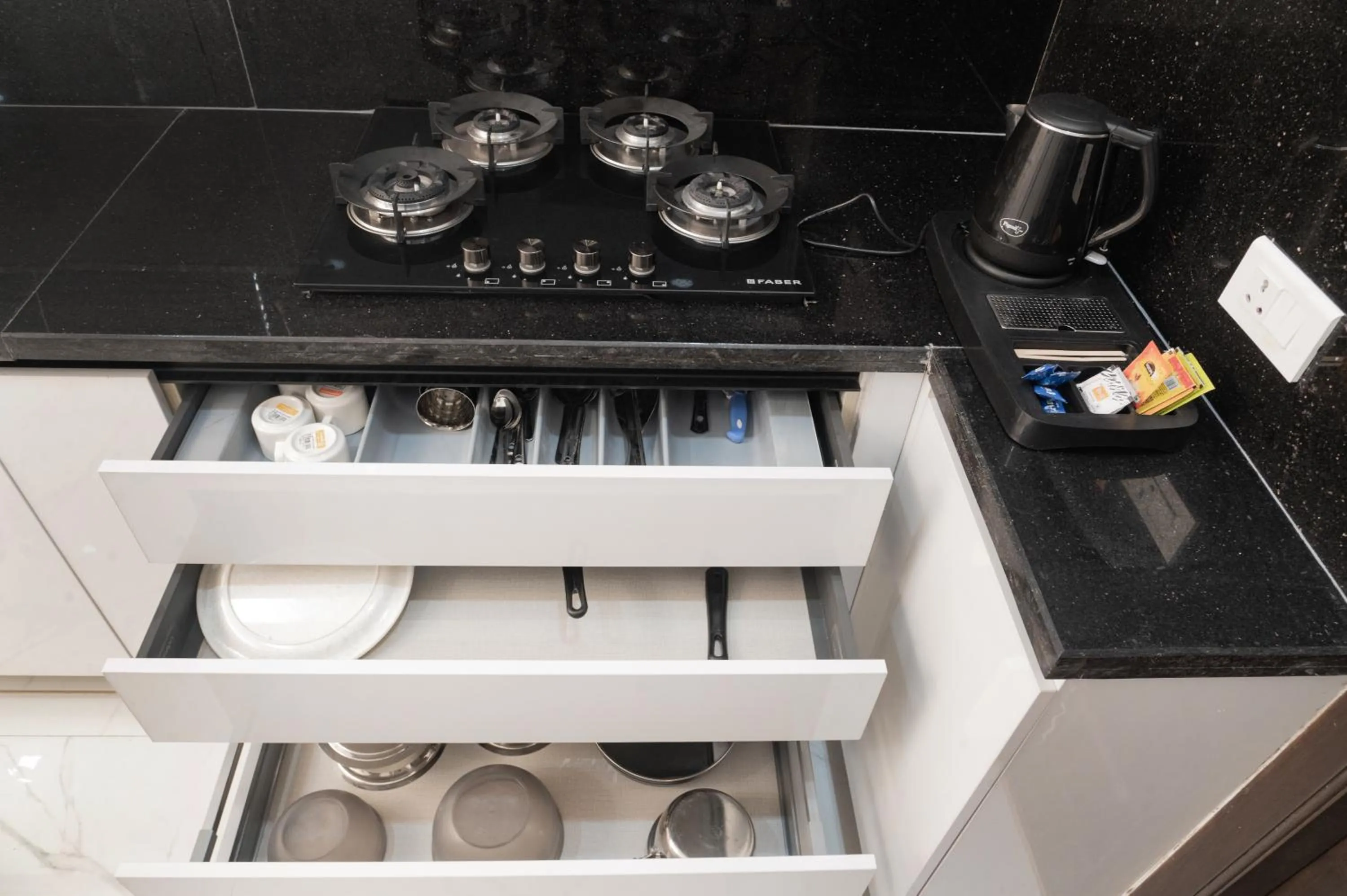 Kitchen or kitchenette in The Balcony Suites