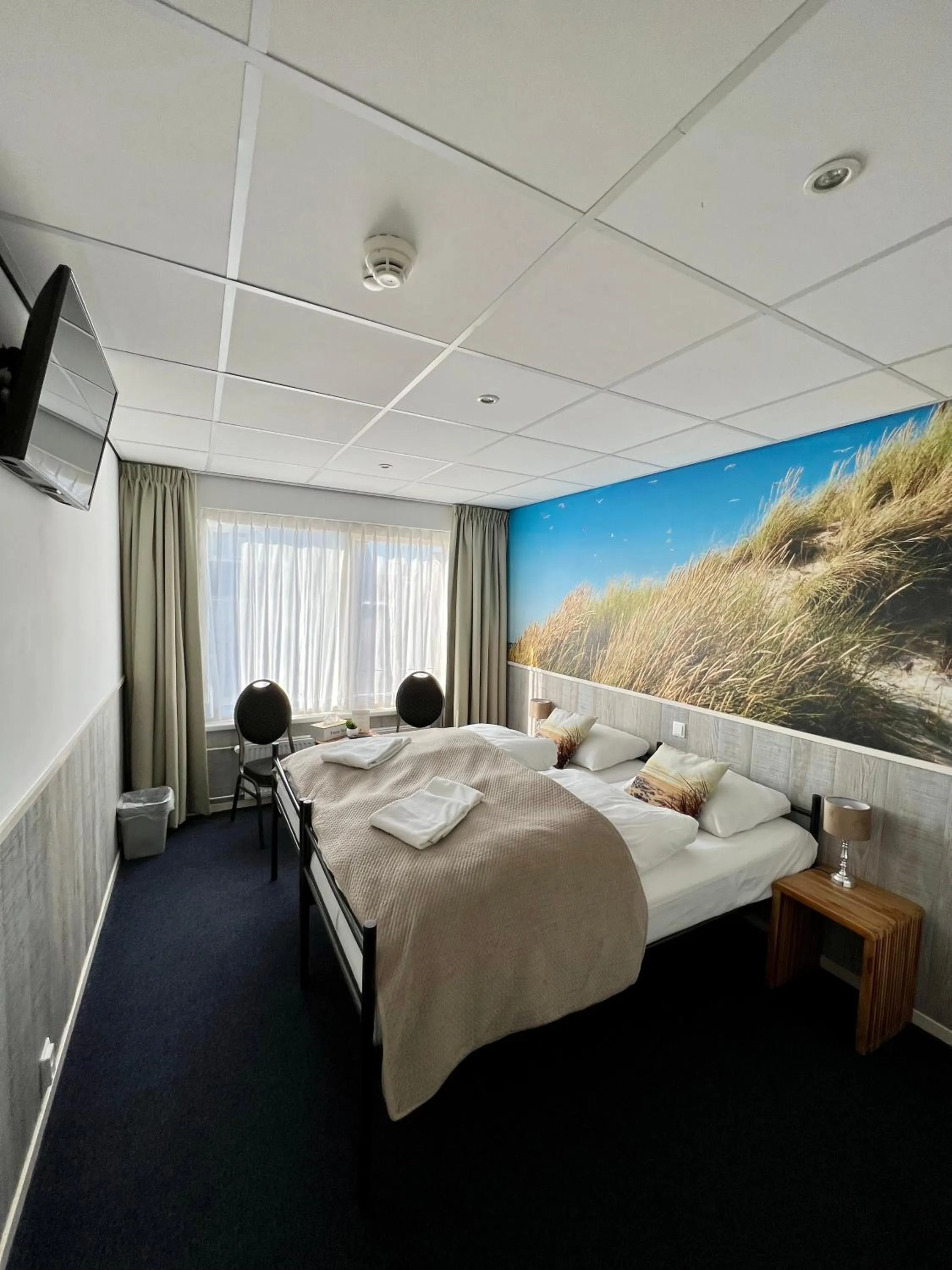 Photo of the whole room, Bed in SEA YOU Hotel Noordwijk