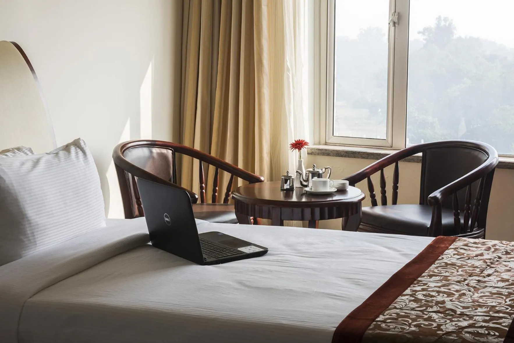 Bed in The Fern Residency Galaxy Mall