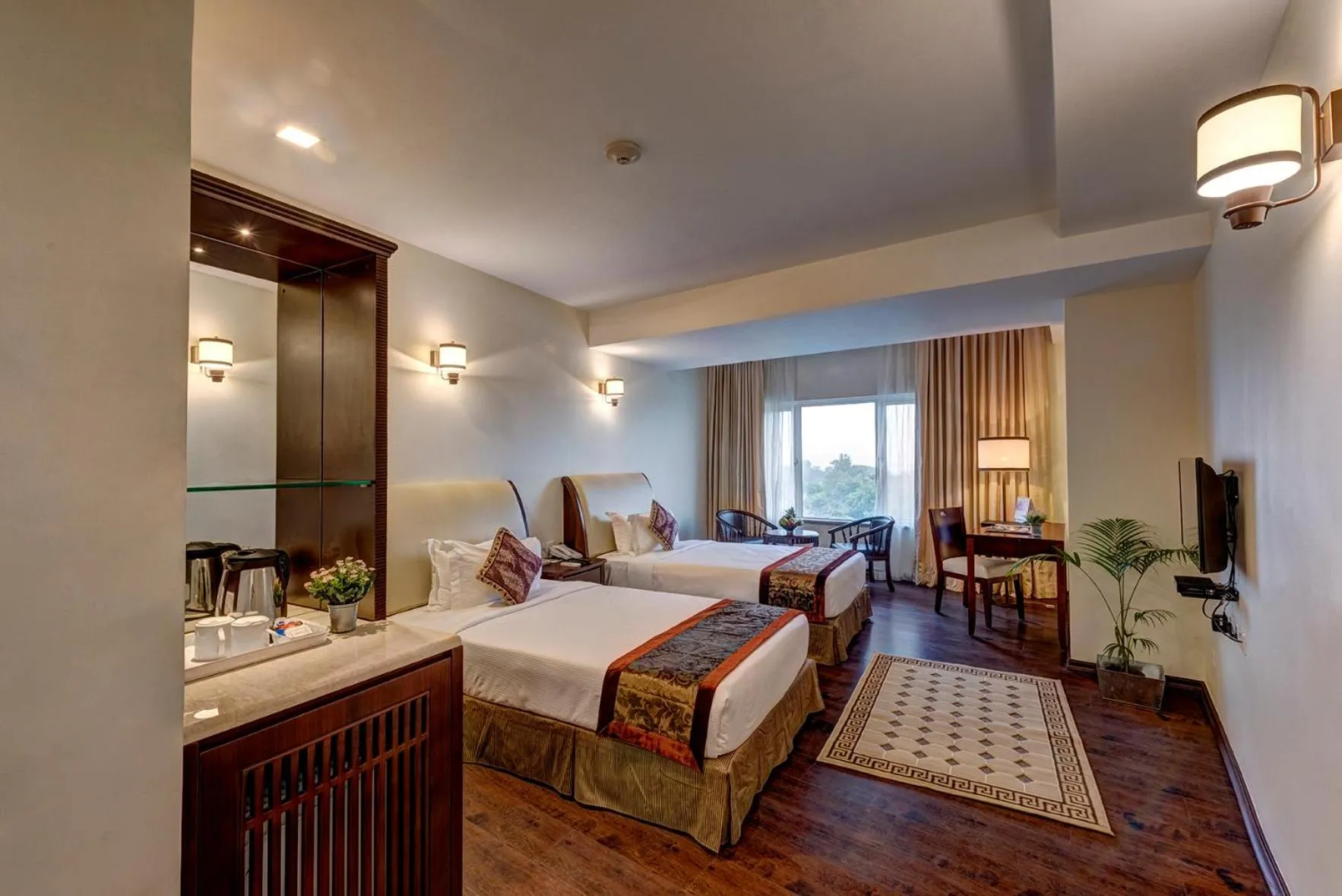 Bedroom in The Fern Residency Galaxy Mall