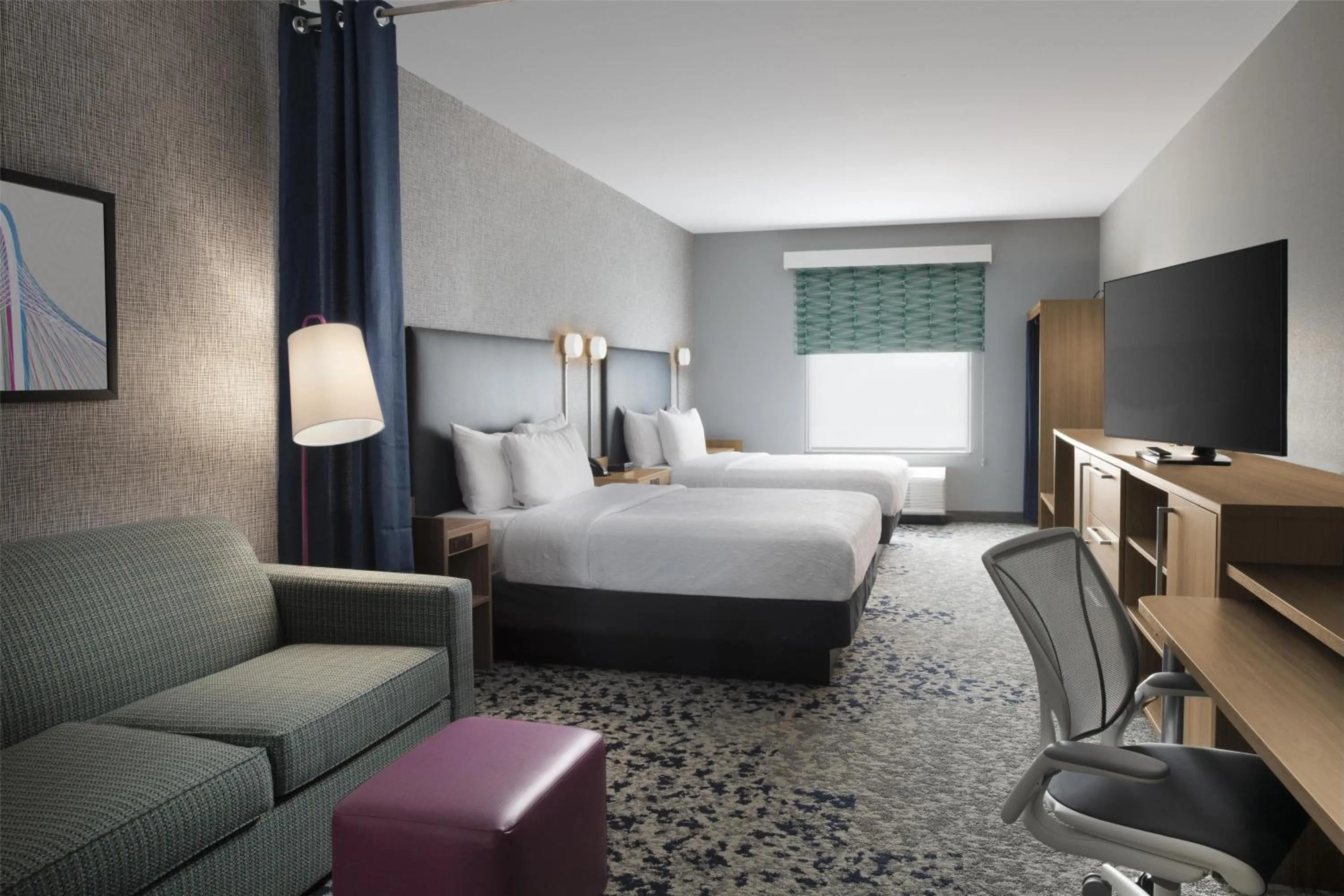 Bed in Home2 Suites By Hilton Dallas East