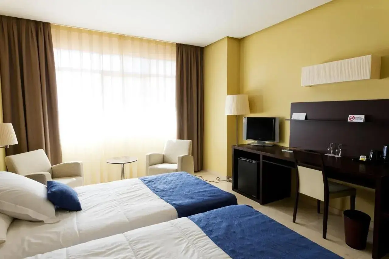 Quadruple Room with Private Bathroom in HOTEL PUERTA DE SAHAGUN Quadruple Room with Private Bathroom in HOTEL PUERTA DE SAHAGUN