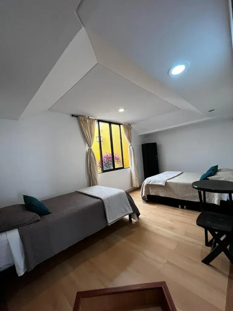 Triple Room with Private External Bathroom in Hostal Amanari Triple Room with Private External Bathroom in Hostal Amanari