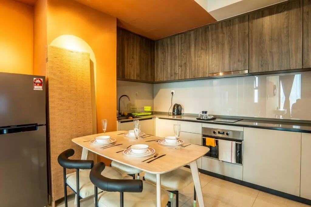 Kitchen or kitchenette in Datum Jelatek Residence by Airhost