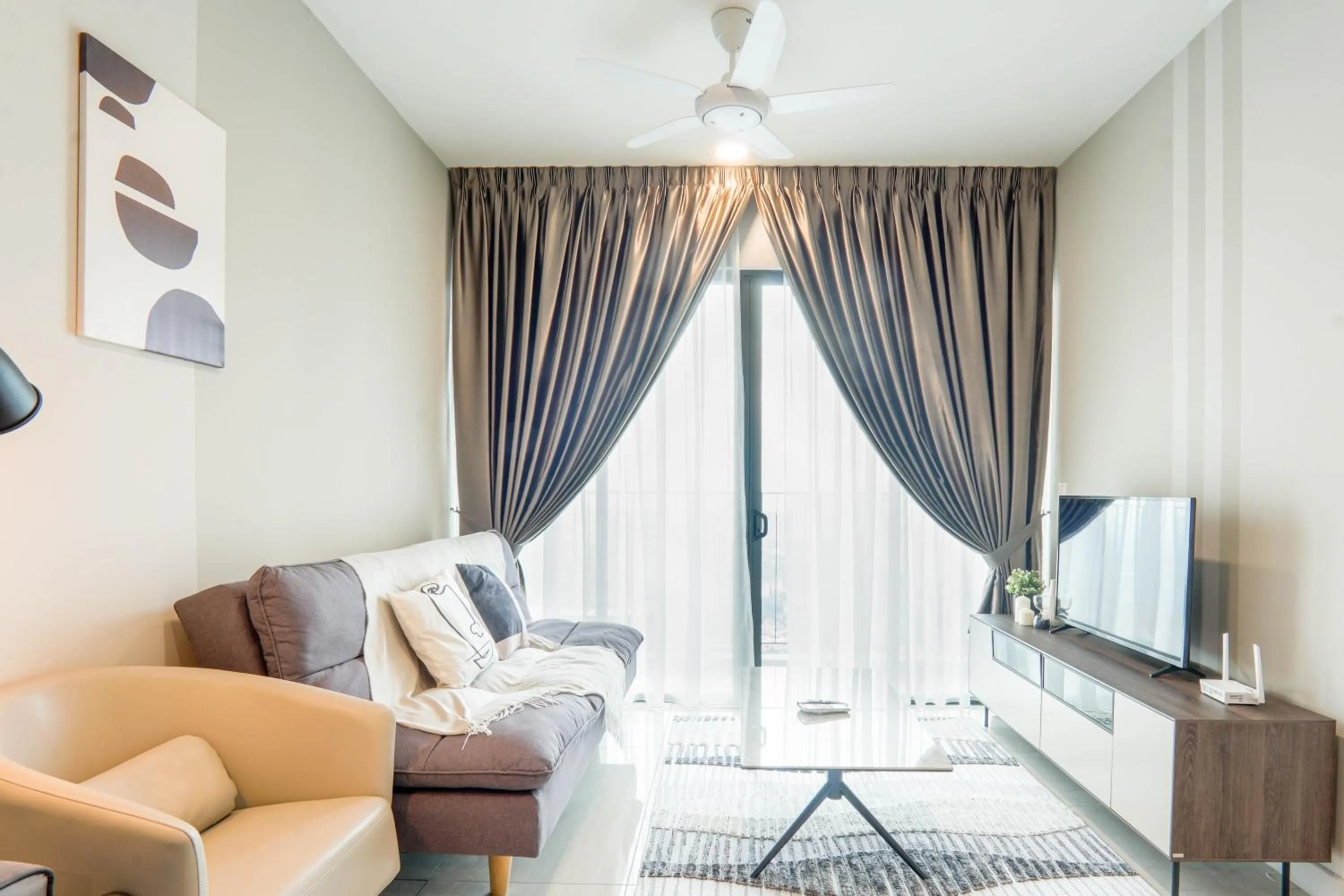 Living room in Datum Jelatek Residence by Airhost