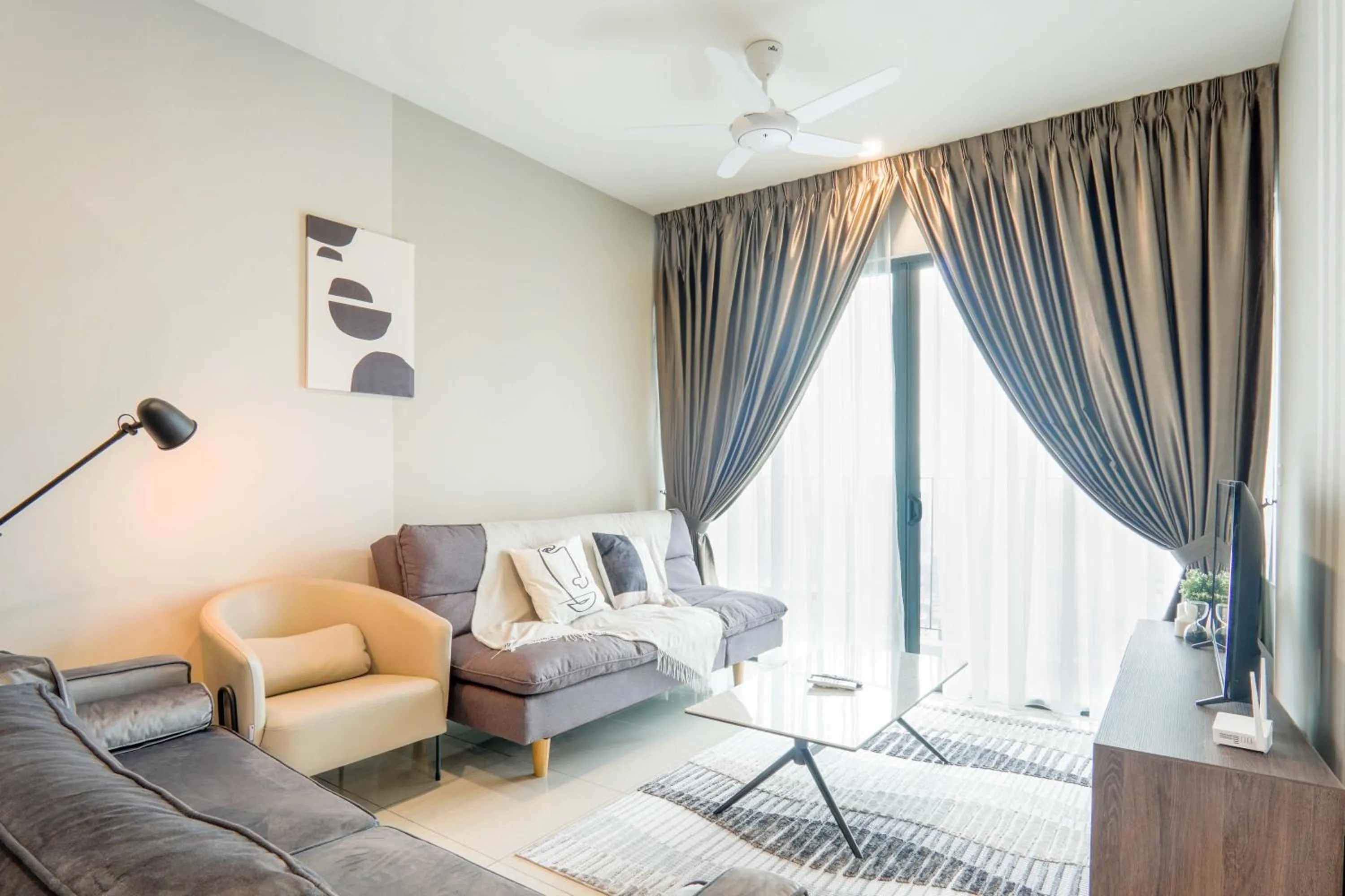 Living room in Datum Jelatek Residence by Airhost