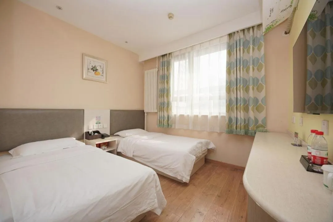 Bed in Beijing Dongdan Hotel Near Wangfujing Street,Tian'AnMen Square,The Forbidden City,Free self-service laundry room