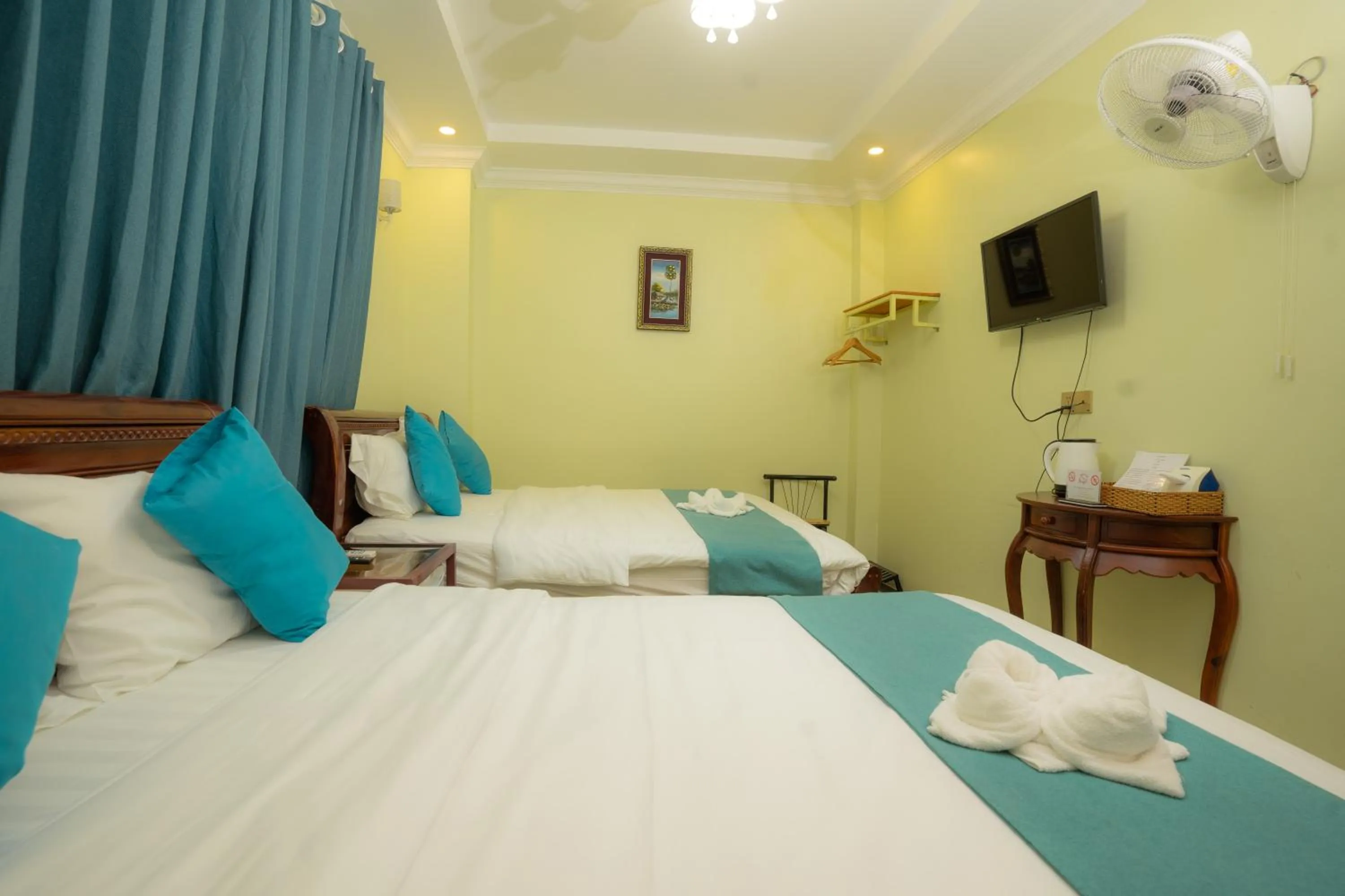 Bed in AHHA Boutique Kampot