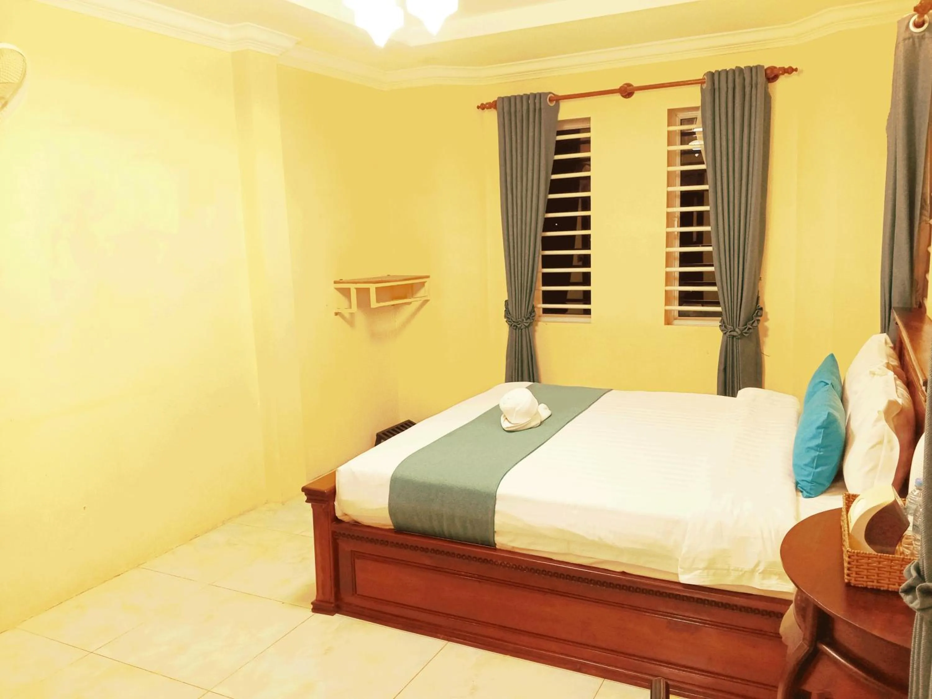 Bed in AHHA Boutique Kampot