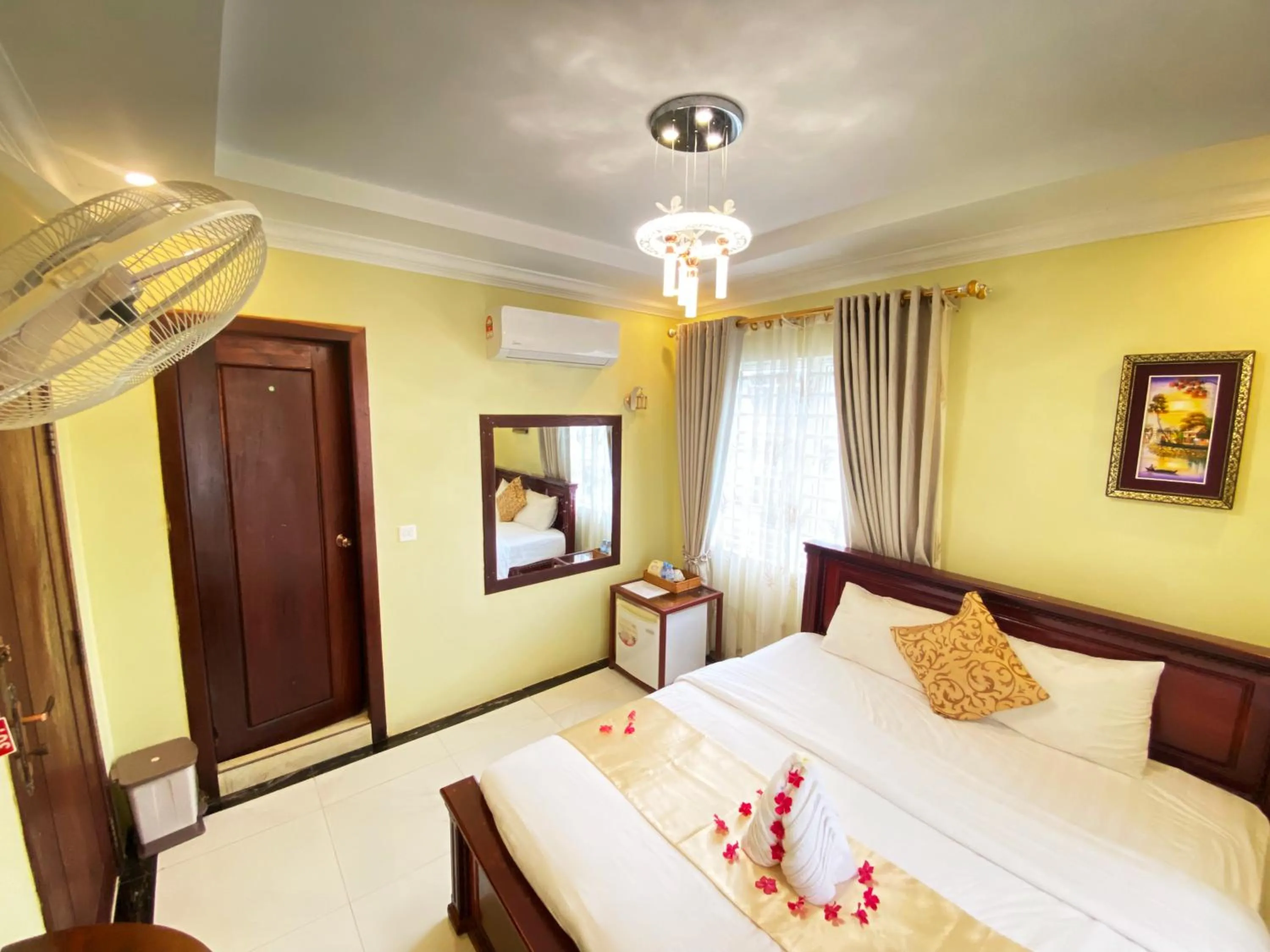 Bed in AHHA Boutique Kampot