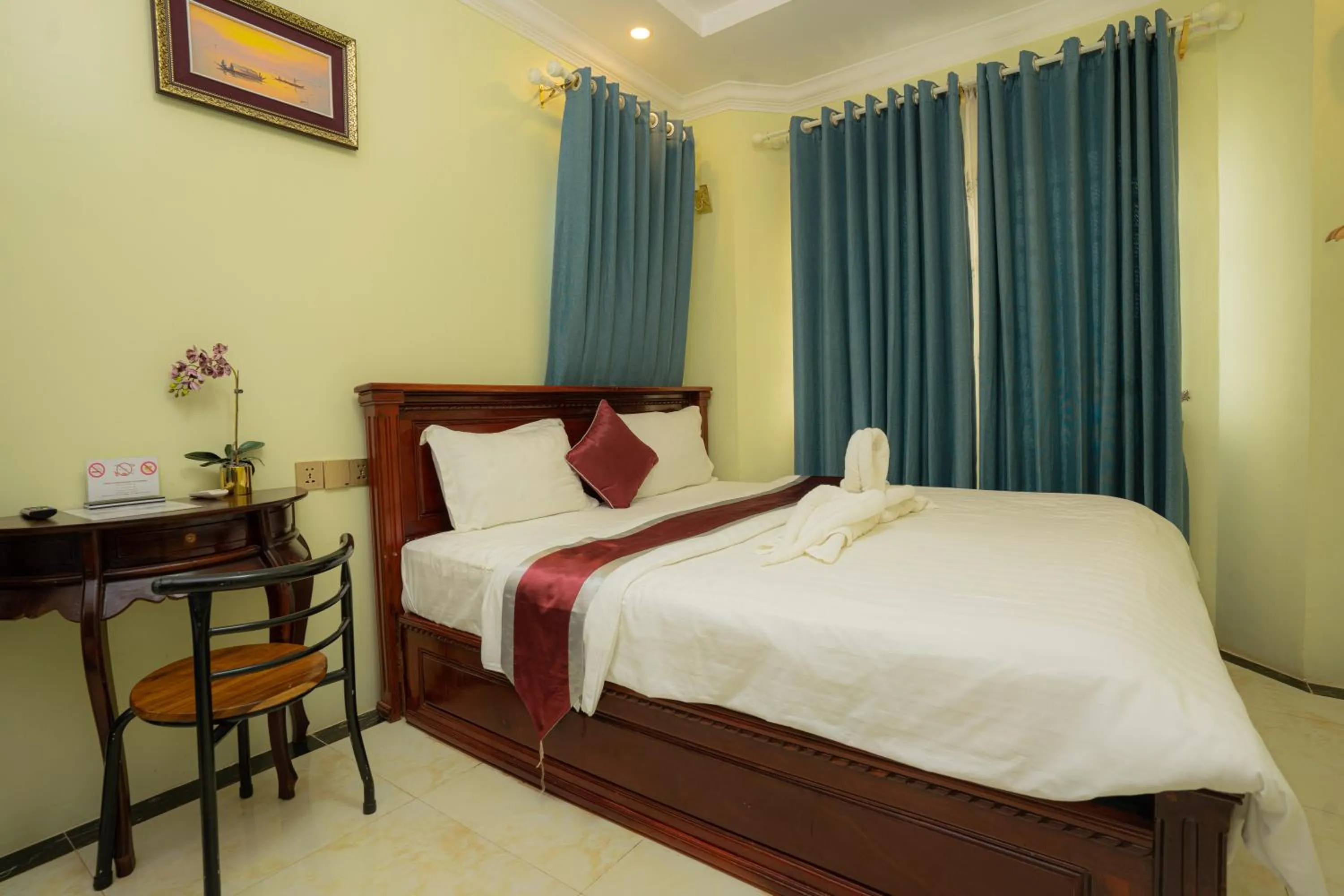 Bed in AHHA Boutique Kampot