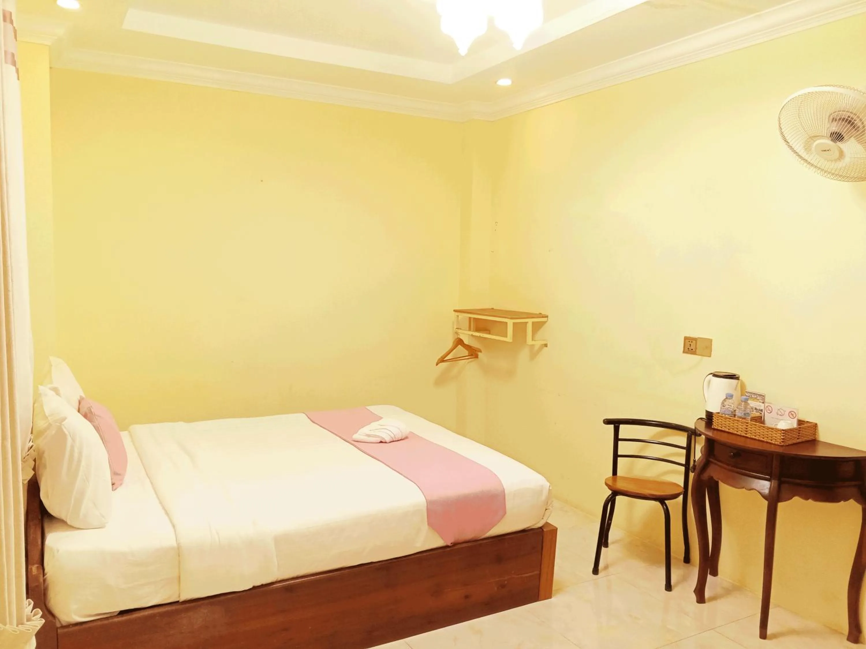 Bed in AHHA Boutique Kampot