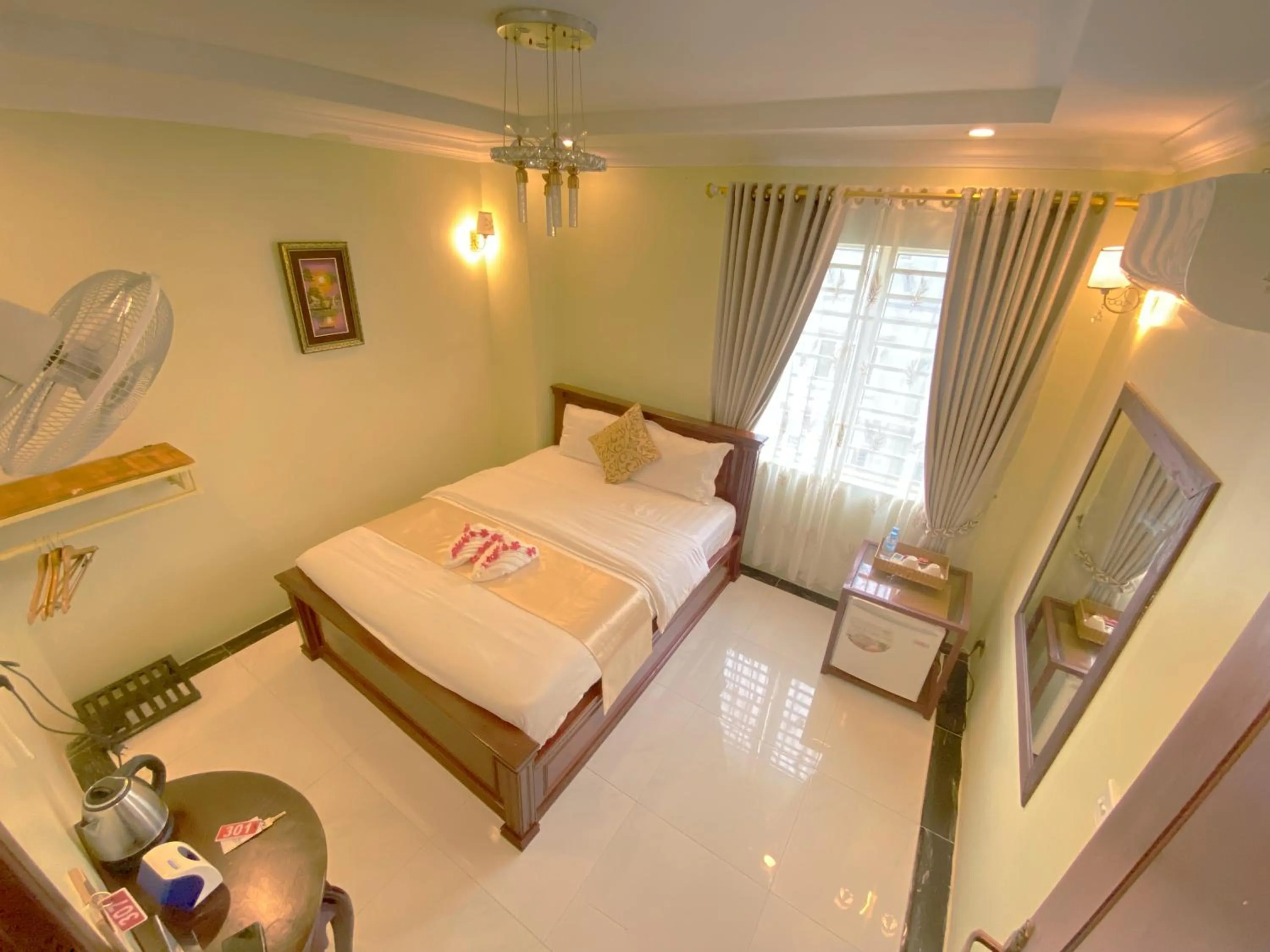 Bed in AHHA Boutique Kampot