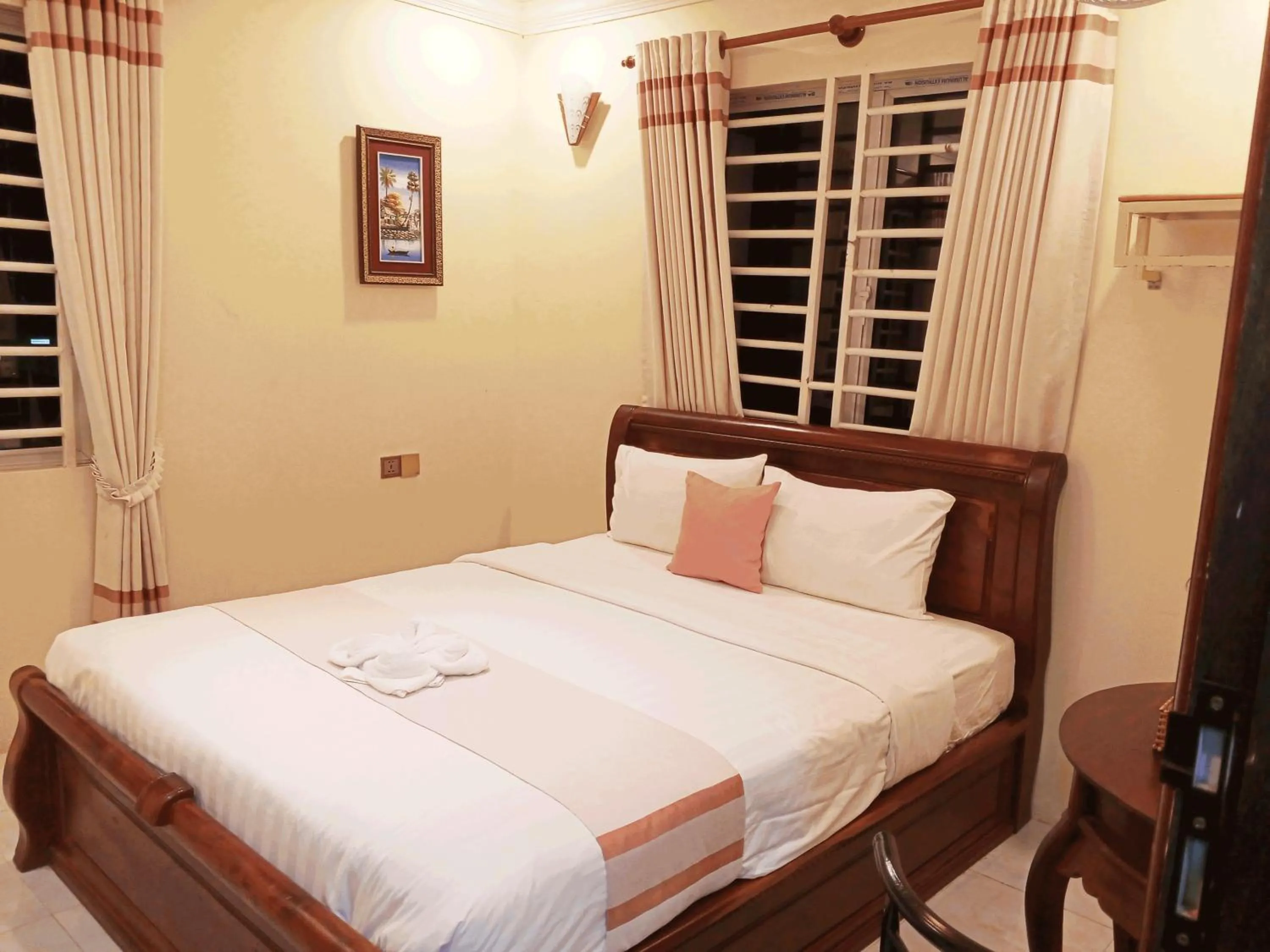 Bed in AHHA Boutique Kampot